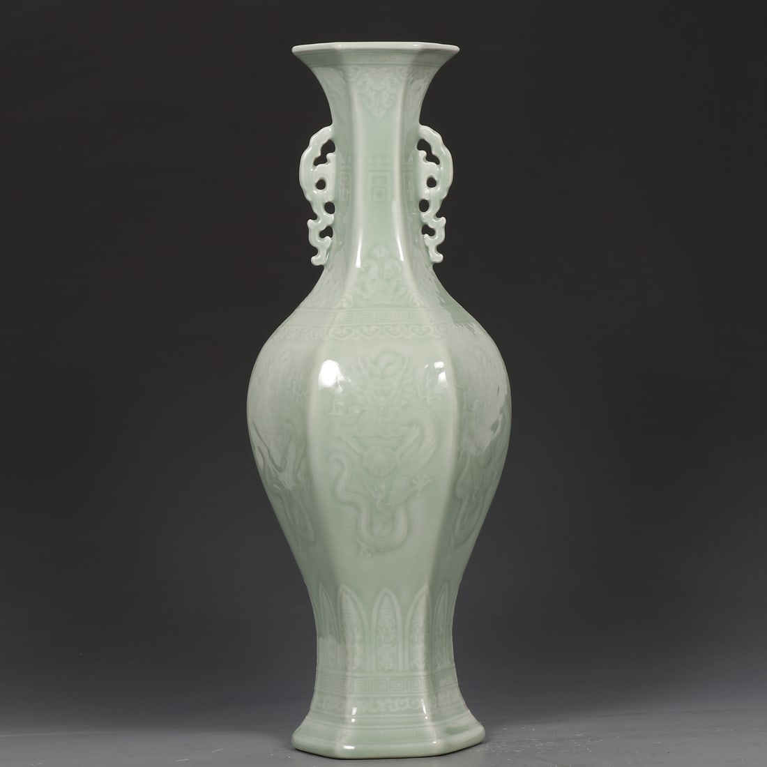 An Exquisite Celadon Glazed Dragon Pattern Vase: An Exquisite Celadon Glazed Dragon Pattern Vase,Qing Dynasty, China,Qianlong Six-character Mark,Size:16.9inx3.9inx6.5in