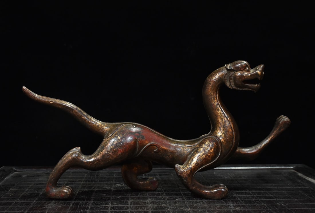 An Exquisite Bronze Slurried-Gold Tiger Ornament: An Exquisite Bronze Slurried-Gold Tiger Ornament,Qing Dynasty, China,Size:6.3inx12.6inx2.8in,Weight:1250g 铜泥金虎摆件,中国清代