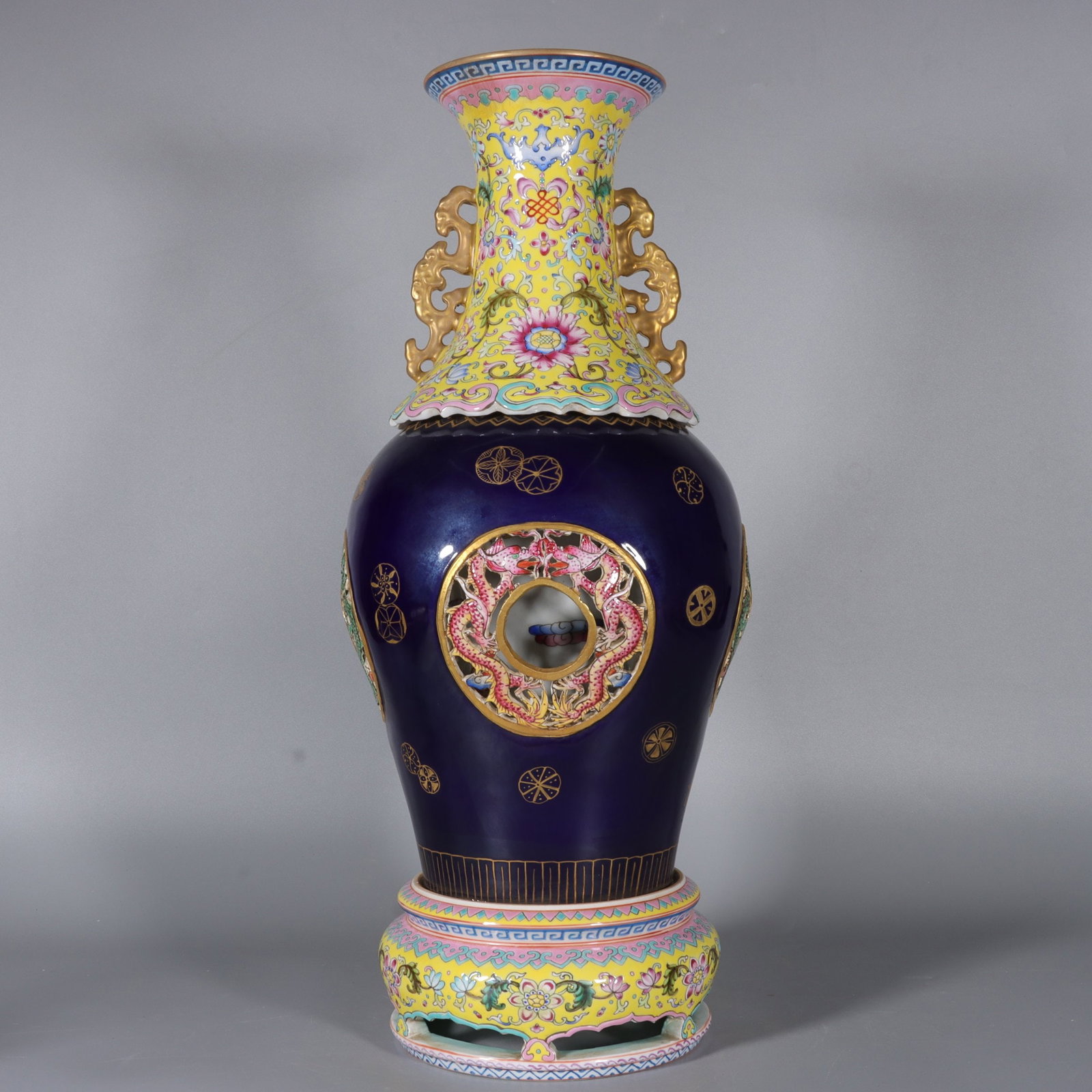 An Exquisite Famille-Rose Ji Blue Glazed Yellow Ground Ball Flower Pattern Vase: An Exquisite Famille-Rose Ji Blue Glazed Yellow Ground Ball Flower Pattern Vase,Qing Dynasty, China,Qianlong Six-character Mark,Size:18.4inx4.6inx7.1inx6.1in 粉彩霁蓝釉&#