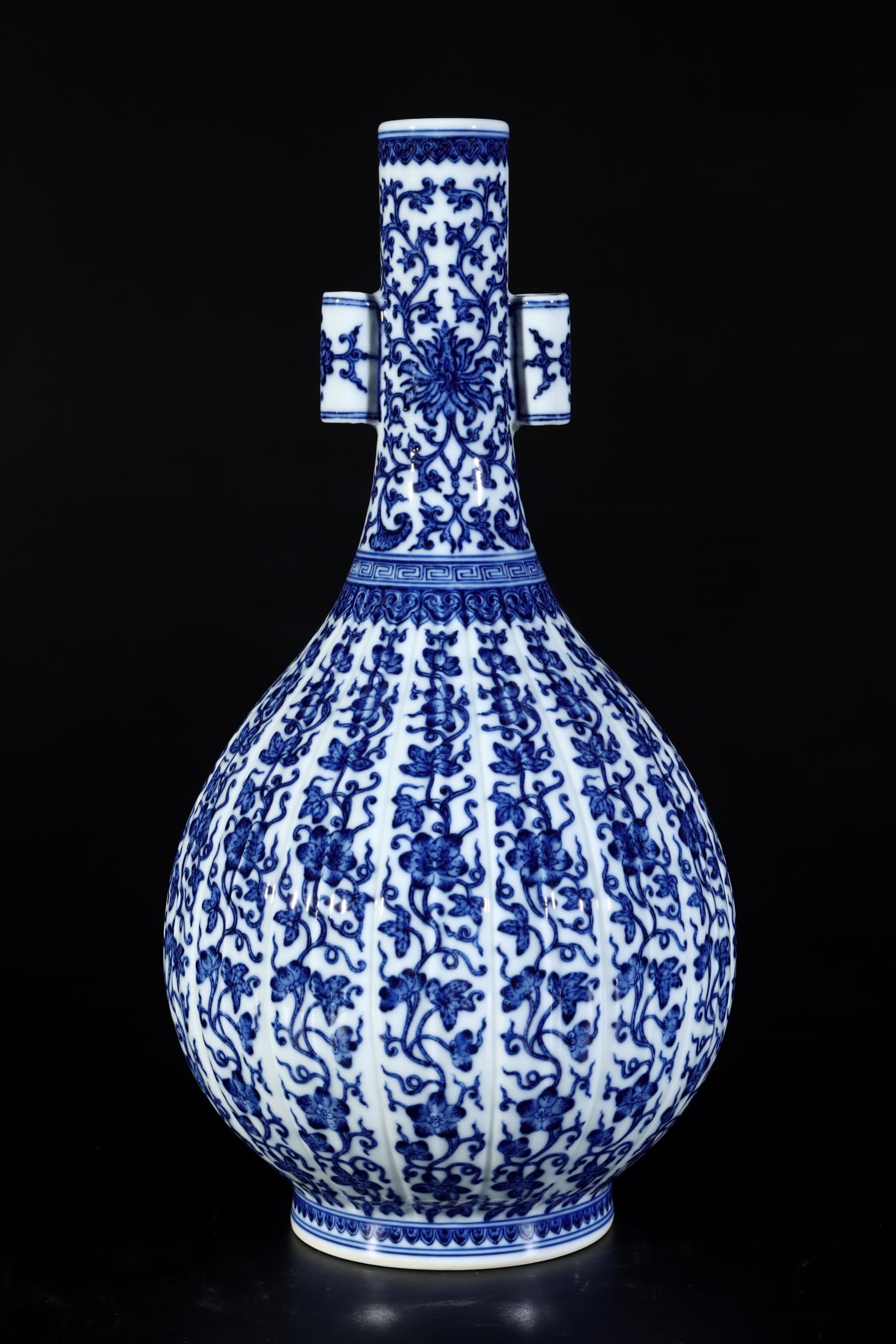 A Rare Blue and White Flower Pattern Double-Ears Vase: A Rare Blue and White Flower Pattern Double-Ears Vase,Qing Dynasty, China,Qianlong Six-character