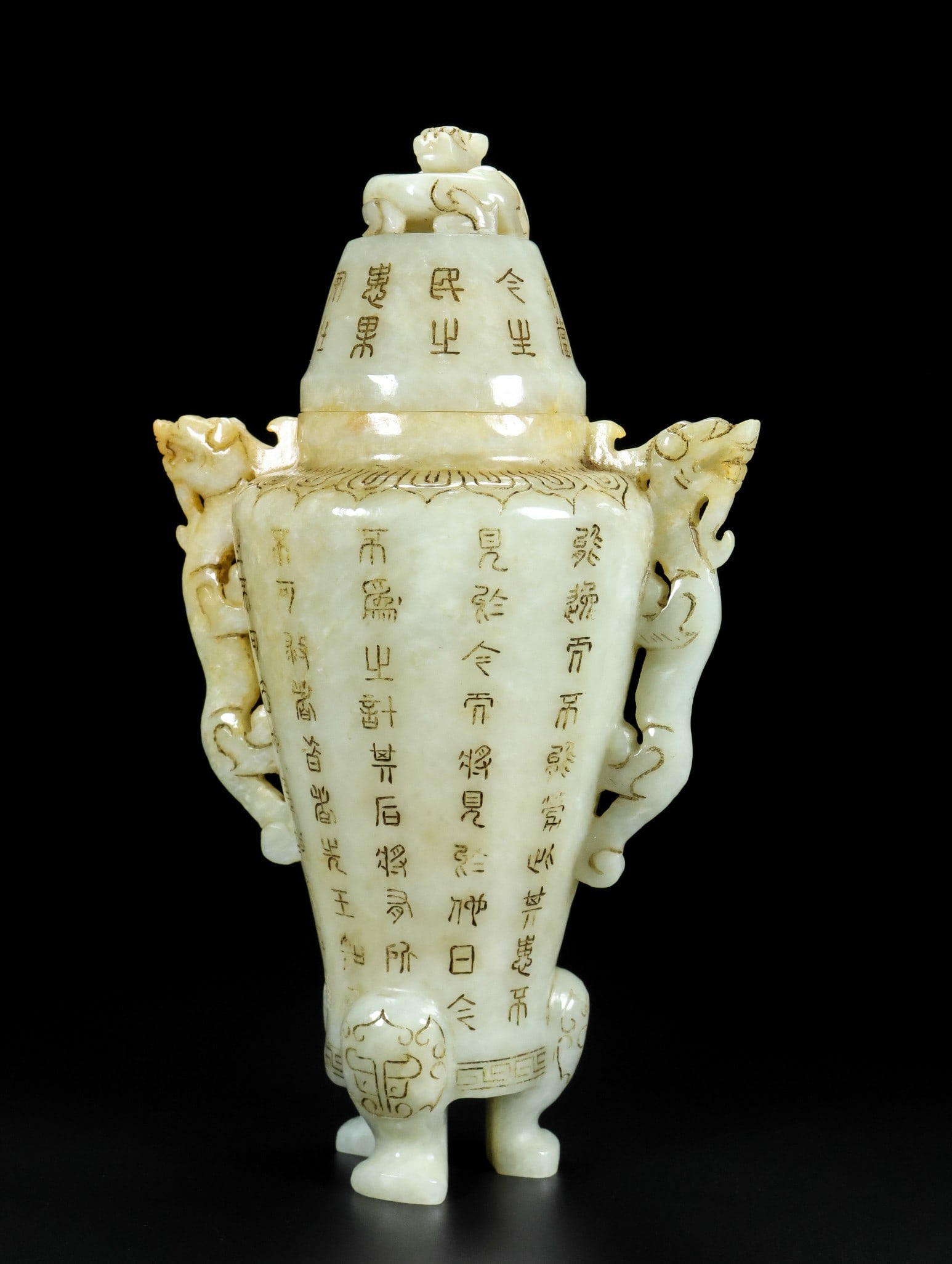 An Exquisite White Jade Poem Dragon-Ears Tripod Vase with Cover: An Exquisite White Jade Poem Dragon-Ears Tripod Vase with Cover,Qing Dynasty,China,Size:5.5inx9.1inx3.9in,Weight:635g白玉诗文龙耳三足盖瓶,&#