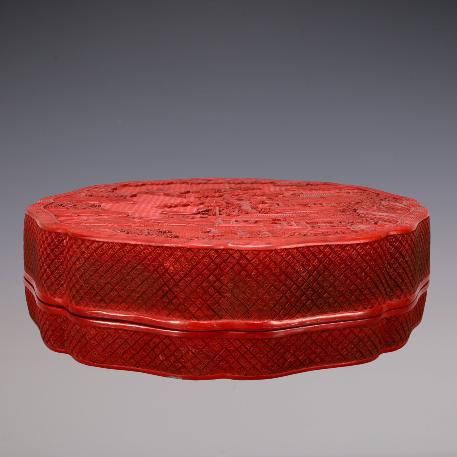 A Exquisite Carved Red Lacquer Character and Story Pattern Box: A Exquisite Carved Red Lacquer Character and Story Pattern Box Qing Dynasty, China Qianlong Six-character Mark Size:15.7inx16.1inx4.7in Weight:7000g漆器人物故事 