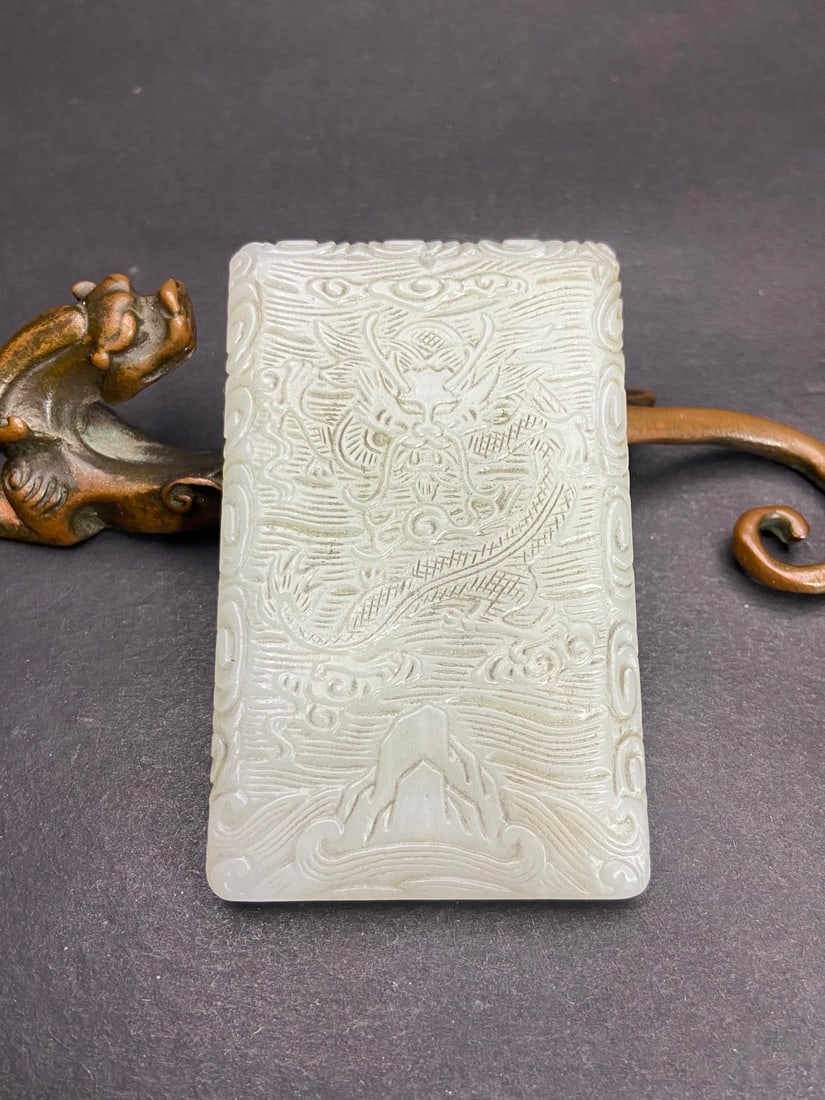 An Exquisite White Jade Seawater Dragon and Phoenix Pattern Pendant: An Exquisite White Jade Seawater Dragon and Phoenix Pattern Pendant,Han Dynasty,China,Size:3.1inx2inx0.3in,Weight:84g白玉海水龙凤纹挂件,中&#