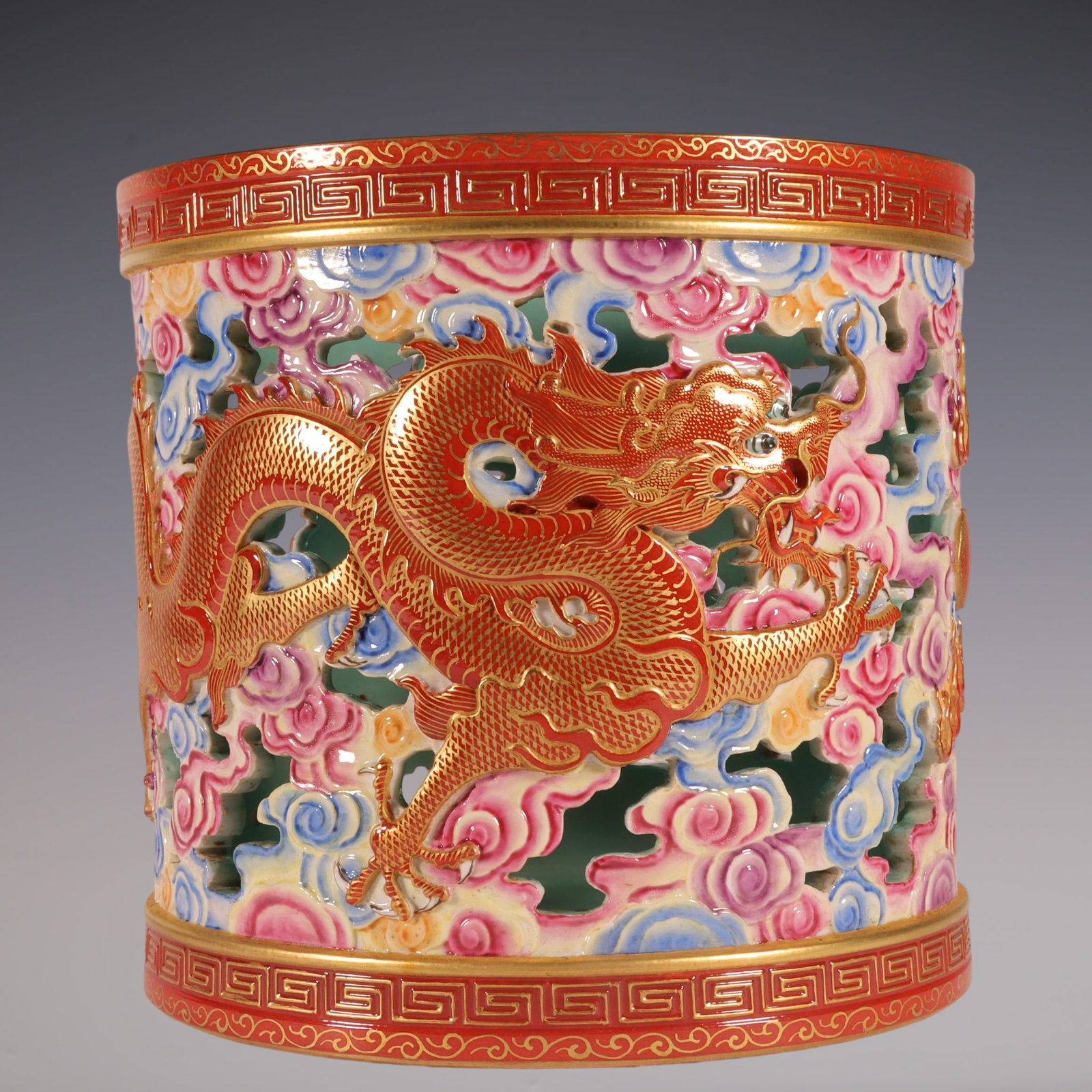 An Exquisite Enamel Painted Gold Hollow Auspicious Cloud and Dragon Pattern Brush Pot: An Exquisite Enamel Painted Gold Hollow Auspicious Cloud and Dragon Pattern Brush Pot,Qing Dynasty, China,Qianlong Six-character Mark,Size:7.7inx8.2in珐琅彩描金镂&#