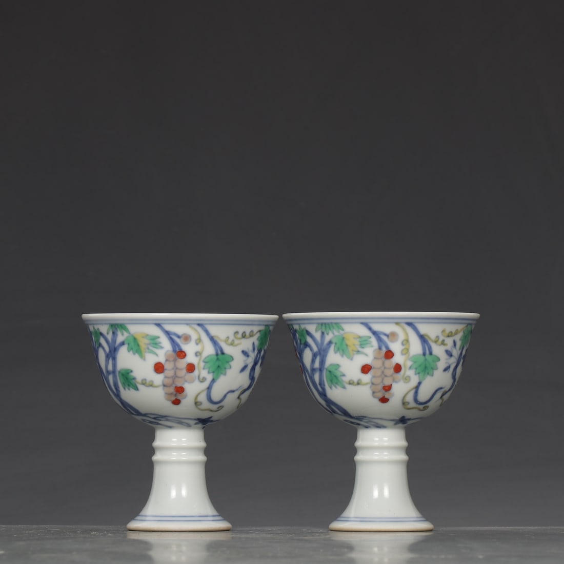 A Pair of Exquisite Blue and White Doucai Grapes Pattern Stem Cups: A Pair of Exquisite Blue and White Doucai Grapes Pattern Stem Cups,Ming Dynasty,China,Chenghua Six-character