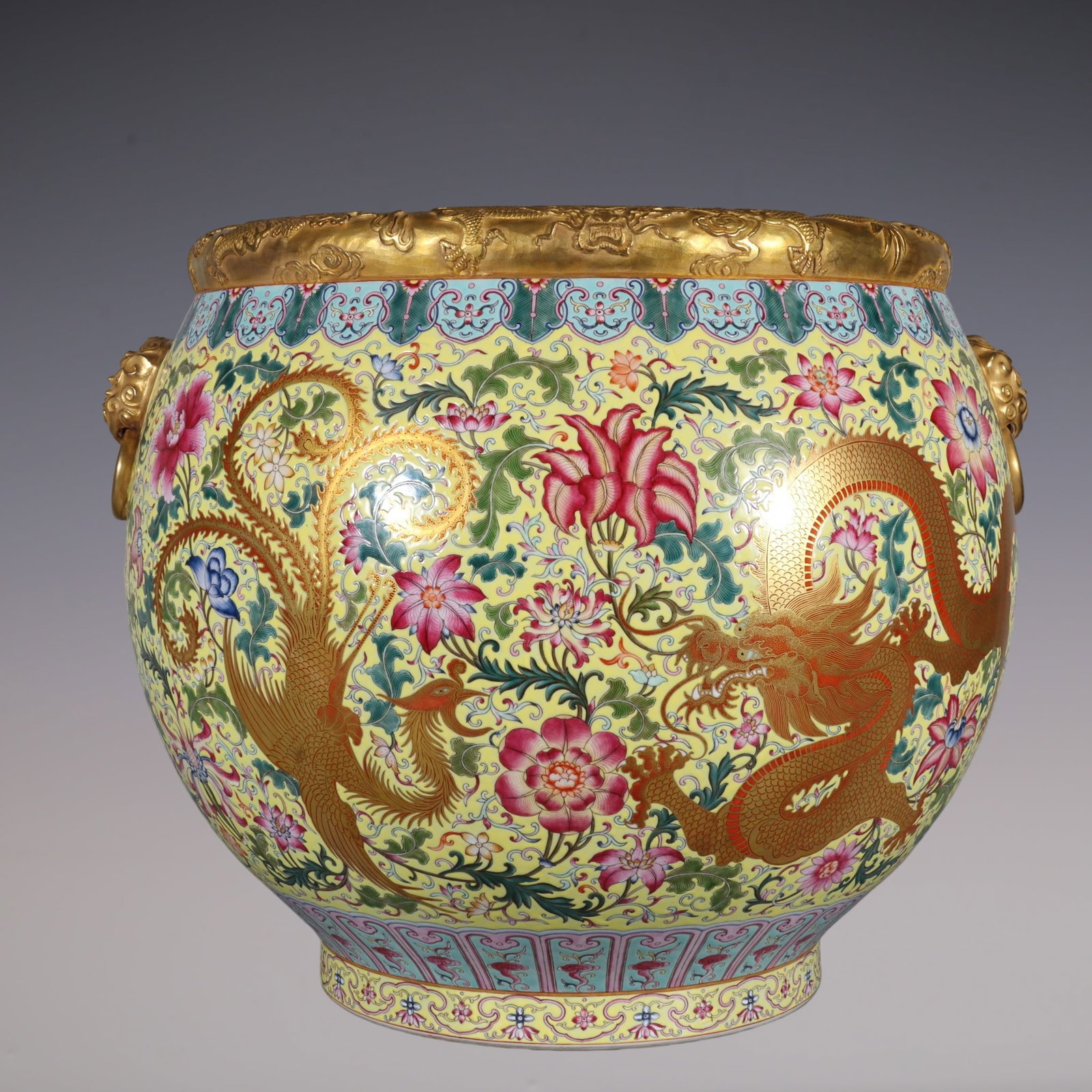 A Huge Famille-Rose Yellow Ground Painted Gold Lotus,Dragon and Phoenix Pattern Beast-Ears Vat: A Huge Famille-Rose Yellow Ground Painted Gold Lotus,Dragon and Phoenix Pattern Beast-Ears Vat,Qing Dynasty, China,Qianlong Four-character Mark,Size:16.9inx16.5inx11in粉彩黄地&