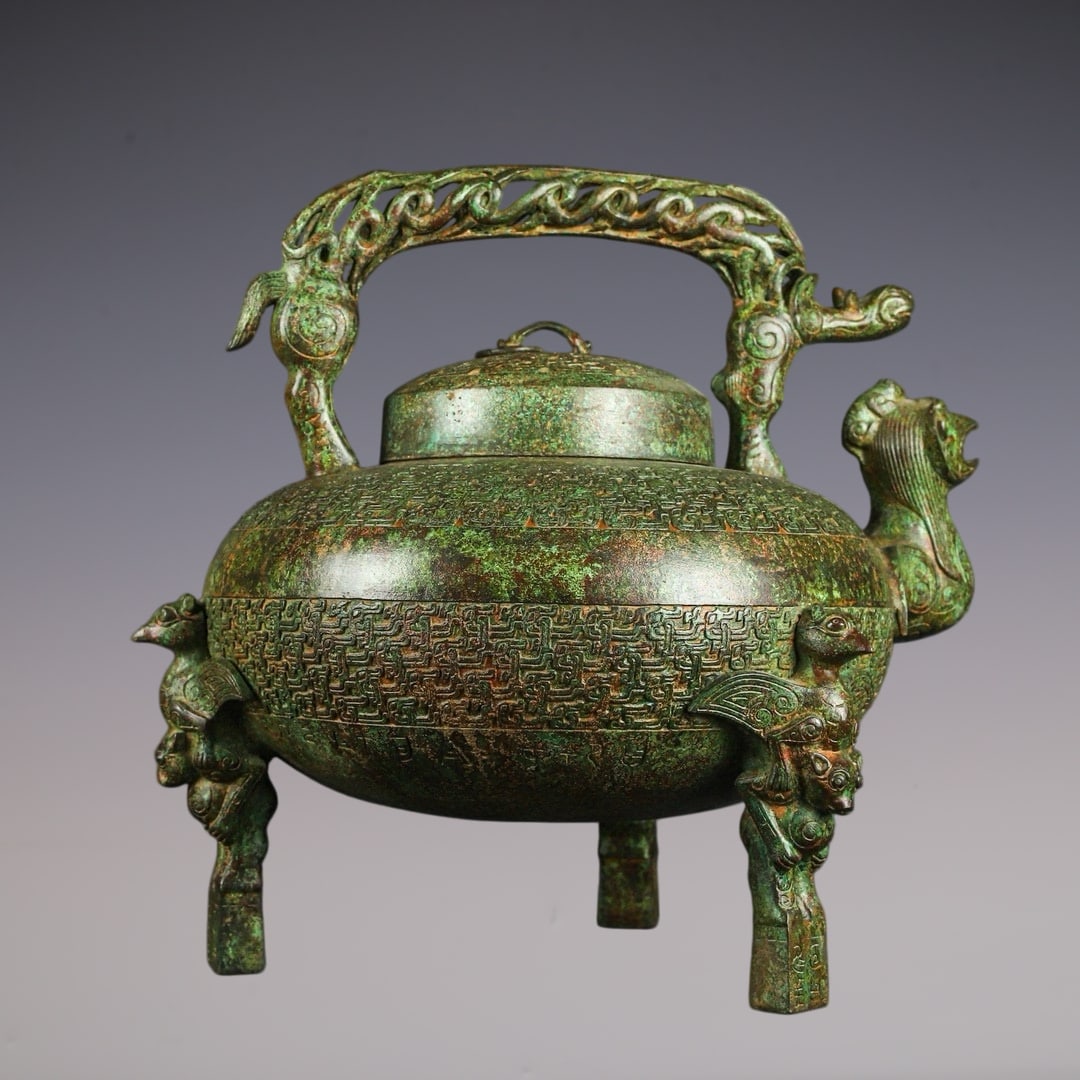 An Archaic Bronze Phoenix Pattern Tripod Loop-Handled Pot - 6