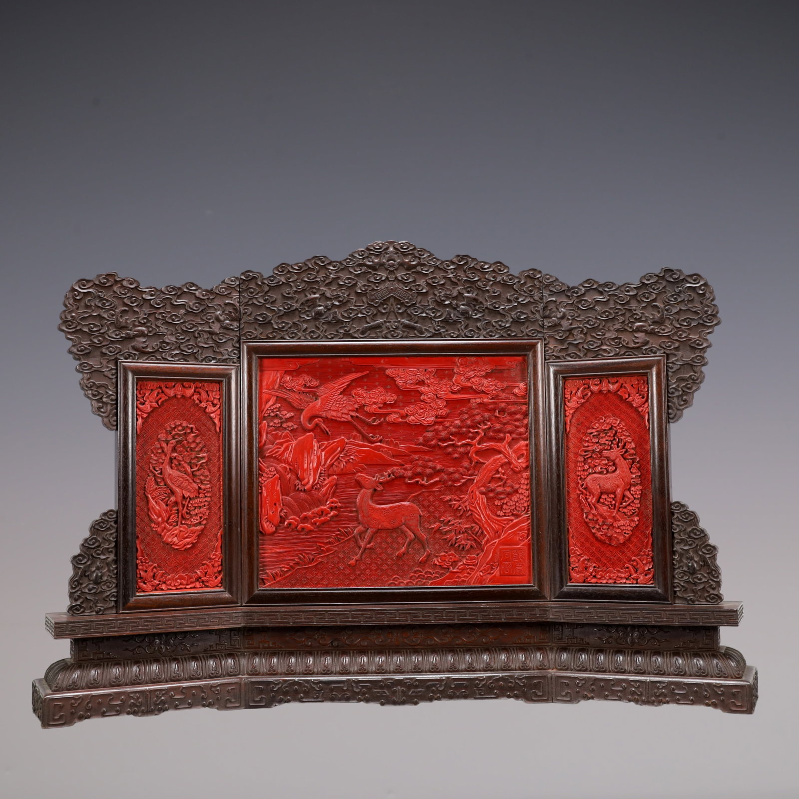 A Exquisite Zitanwood Inlaid Carved Red Lacquer Pine and Crane Pattern Sika Deer Pattern Screen: A Exquisite Zitanwood Inlaid Carved Red Lacquer Pine and Crane Pattern Sika Deer Pattern Screen Qing Dynasty, China Size:23.2inx5.5inx15.2in