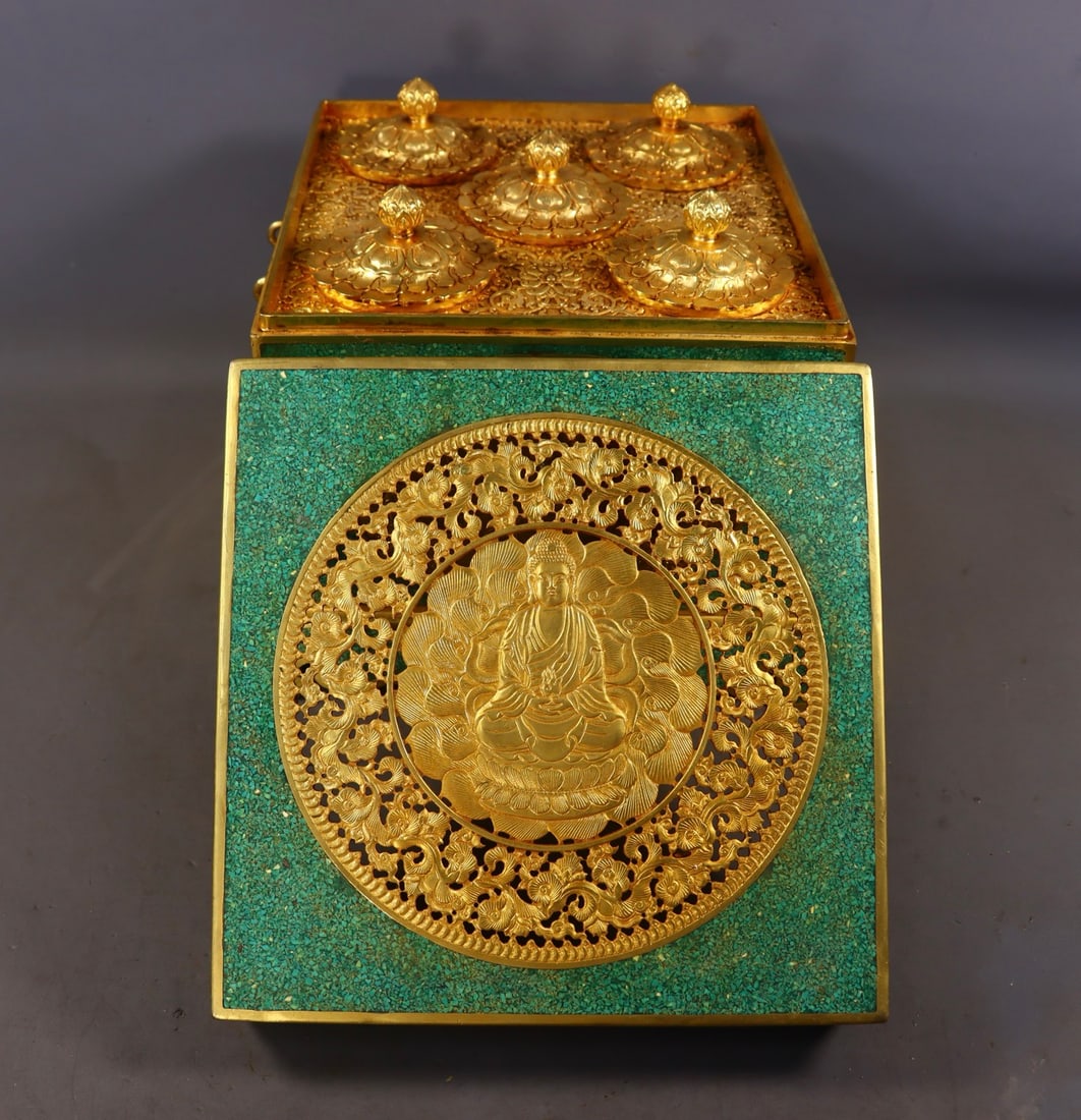A Set of Fine Gilt Bronze Inlaid Turquoise Hollow Buddha Statue Pattern Scriptures: A Set of Fine Gilt Bronze Inlaid Turquoise Hollow Buddha Statue Pattern Scriptures,Qing Dynasty,China,Qianlong Four-character Mark,Size:9.3inx11.2inx11.2in,(Scriptures)2.4inx41.3inx5.9in,Weight:12260g