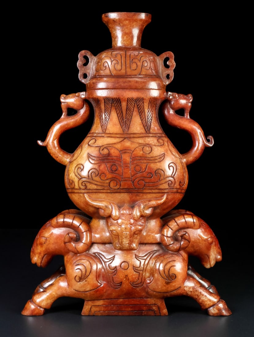 An Exquisite White Jade Beast-Face Pattern Beast-Ears Sheep-Shaped Vase with Cover: An Exquisite White Jade Beast-Face Pattern Beast-Ears Sheep-Shaped Vase with Cover,Qing Dynasty,China,Size:7.4inx10.7inx3.5in,Weight:2398g白玉兽面纹兽耳ು