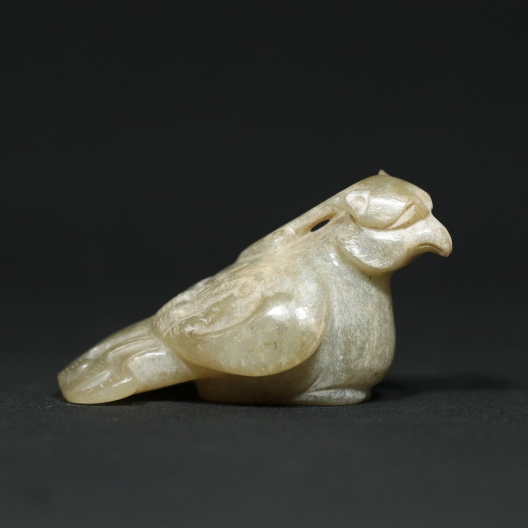An Exquisite White Jade Bird Pendant: An Exquisite White Jade Bird Pendant,Han Dynasty,China,Size:2.5inx1.4inx1.4in,Weight:57.5g白玉鸟挂件,中国汉代,Size:6.4cmx3.6cmx3.5cm,Weight:57.5g