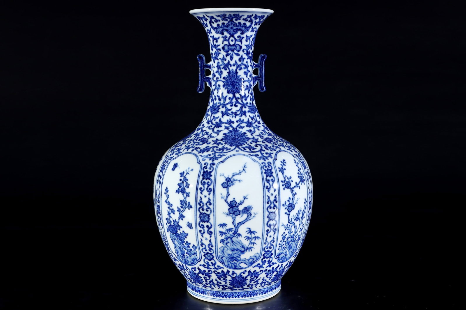 A Rare Blue and White Flower and Bird Pattern Double-Ears Vase: A Rare Blue and White Flower and Bird Pattern Double-Ears Vase,Qing Dynasty, China,Qianlong Six-character Mark,Size:14.3inx8.3in青花花鸟纹双耳瓶,中