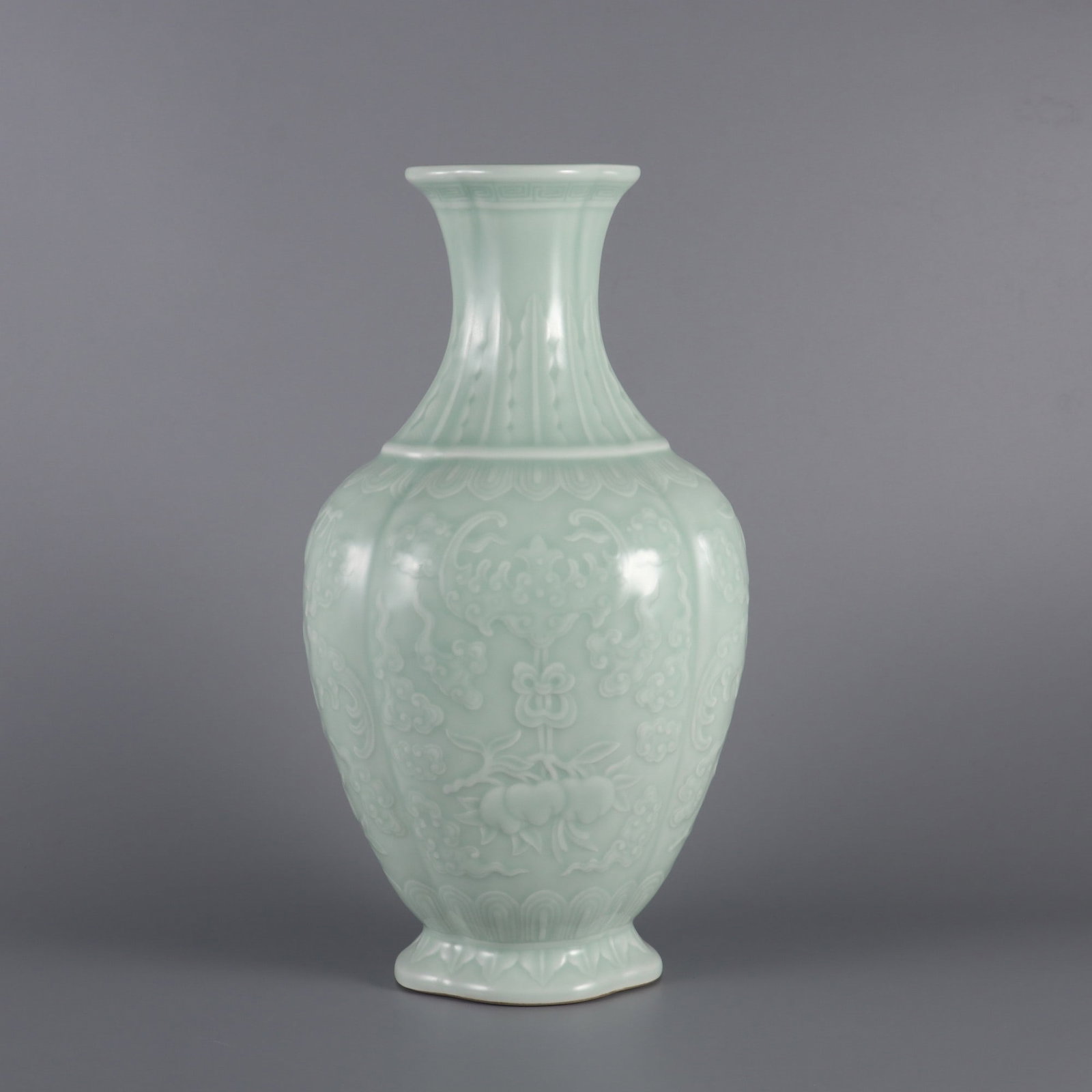 A Rare Celadon Glazed Bats and Peach Pattern Vase: A Rare Celadon Glazed Bats and Peach Pattern Vase,Qing Dynasty, China,Qianlong Six-character Mark,Size:13.1inx6.3inx3.5in青釉福寿纹瓶,中国清ߣ