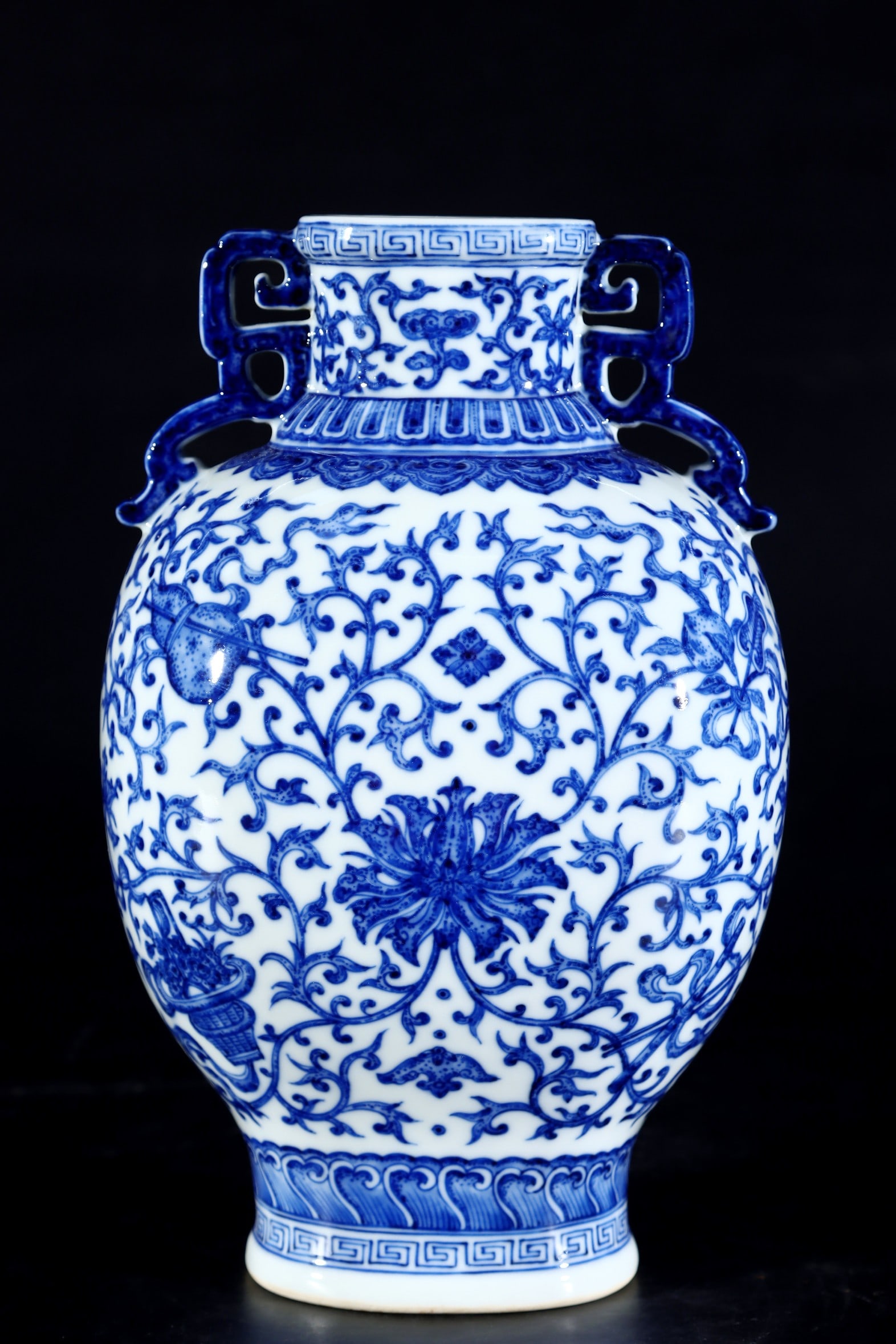 An Exquisite Blue and White Lotus and Eight Treasures Pattern Double-Ears Vase: An Exquisite Blue and White Lotus and Eight Treasures Pattern Double-Ears Vase,Qing Dynasty, China,Qianlong Six-character