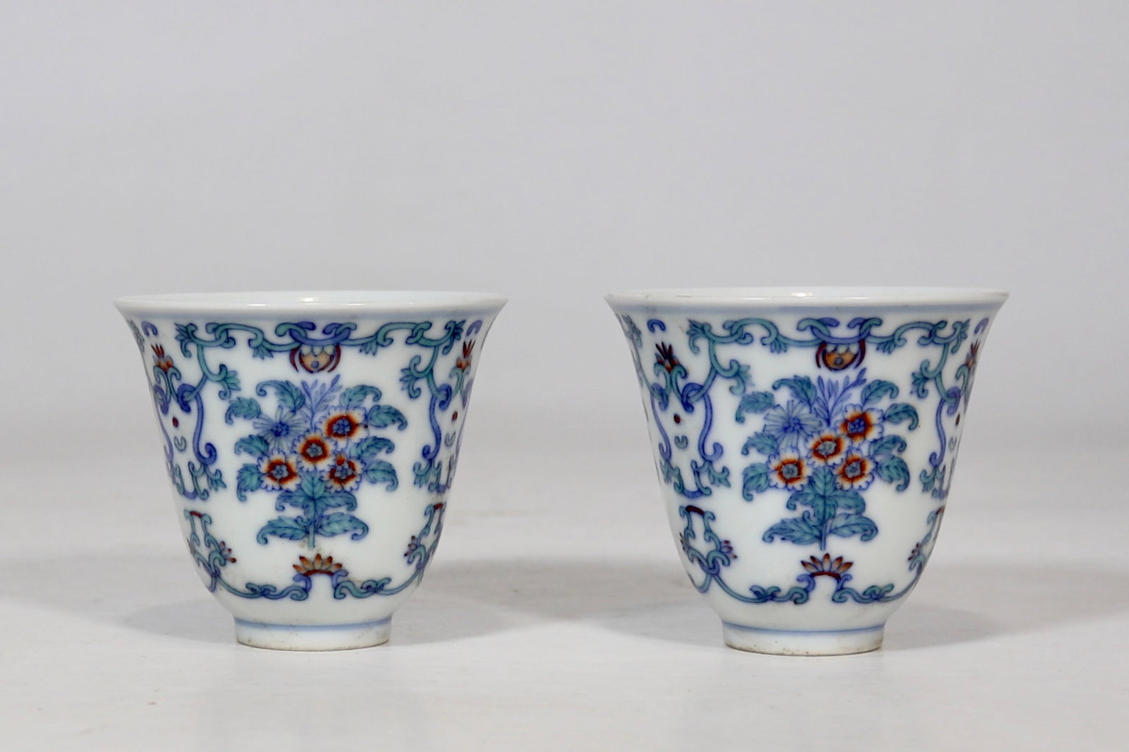 A Pair of Exquisite Blue and White Doucai Flower Pattern Cup: A Pair of Exquisite Blue and White Doucai Flower Pattern Cup,Qing Dynasty, China,Yongzheng Six-character