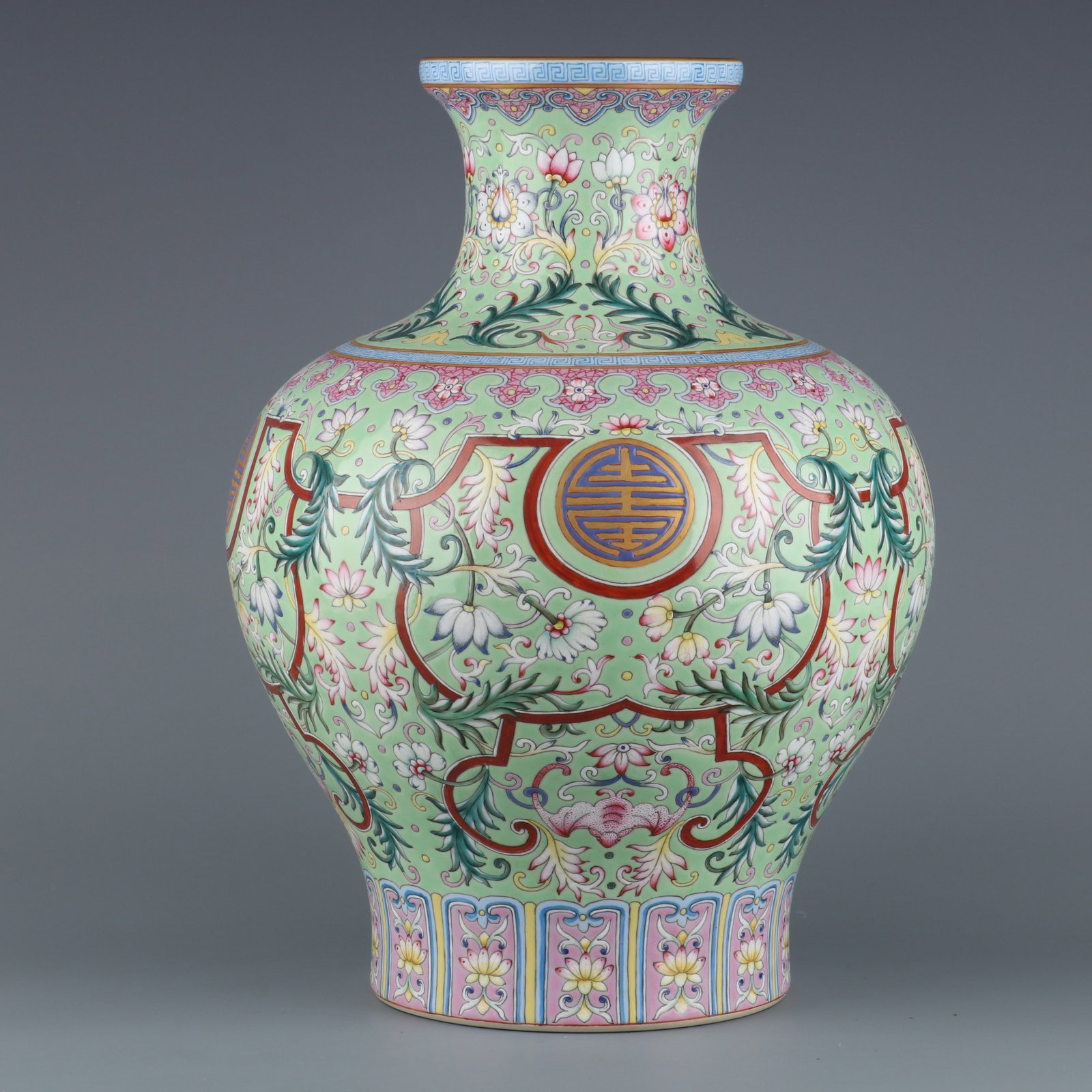 A Rare Green Ground Famille-Rose Painted Gold Lotus Pattern Vase: A Rare Green Ground Famille-Rose Painted Gold Lotus Pattern Vase,Qing Dynasty, China,Qianlong Six-character Mark,Size:14inx4.7in绿地粉彩描金缠枝莲