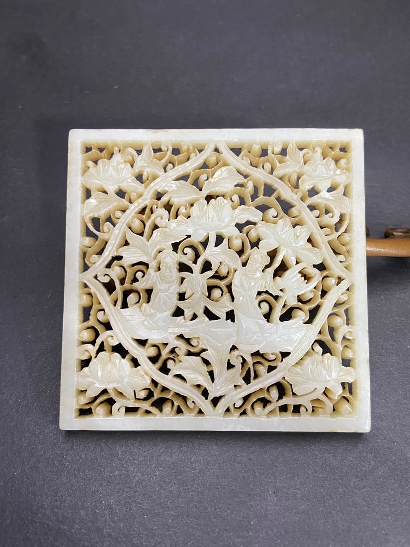 An Exquisite White Jade Hollow Lotus and Figure Pattern Ornament: An Exquisite White Jade Hollow Lotus and Figure Pattern Ornament,Qing Dynasty,China,Size:3.2inx3.2inx0.3in,Weight:84g白玉镂空荷花人物纹摆