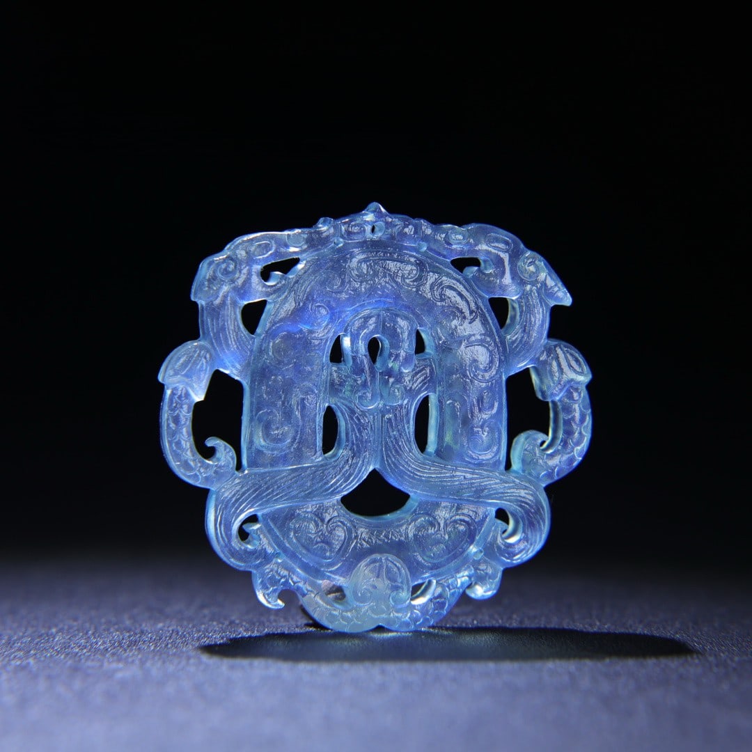 An Exquisite Aquamarine Dragon Pattern Pendant: An Exquisite Aquamarine Dragon Pattern Pendant,Qing Dynasty,China,Size:2inx2inx0.3in,Weight:28g海蓝宝龙纹挂件,中国清代,Size:5.2cmx5.1c