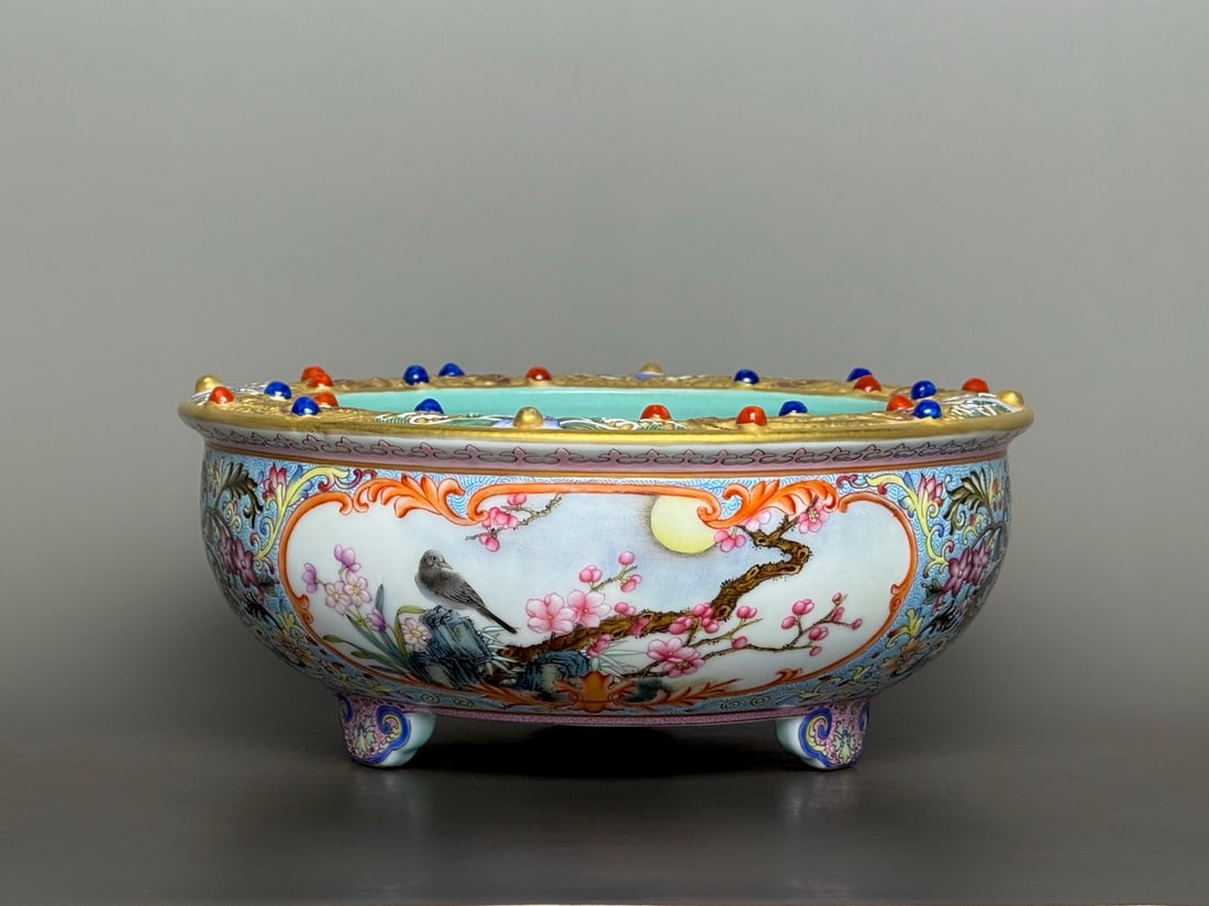 An Exquisite Famille-Rose Painted Gold Flower and Bird Pattern Tripod Water Pot,Inlaid Gems: An Exquisite Famille-Rose Painted Gold Flower and Bird Pattern Tripod Water Pot,Inlaid Gems,Qing Dynasty,China,Qianlong Four-character Mark,Size:8.1inx3.5inx5.1in粉彩描金഑