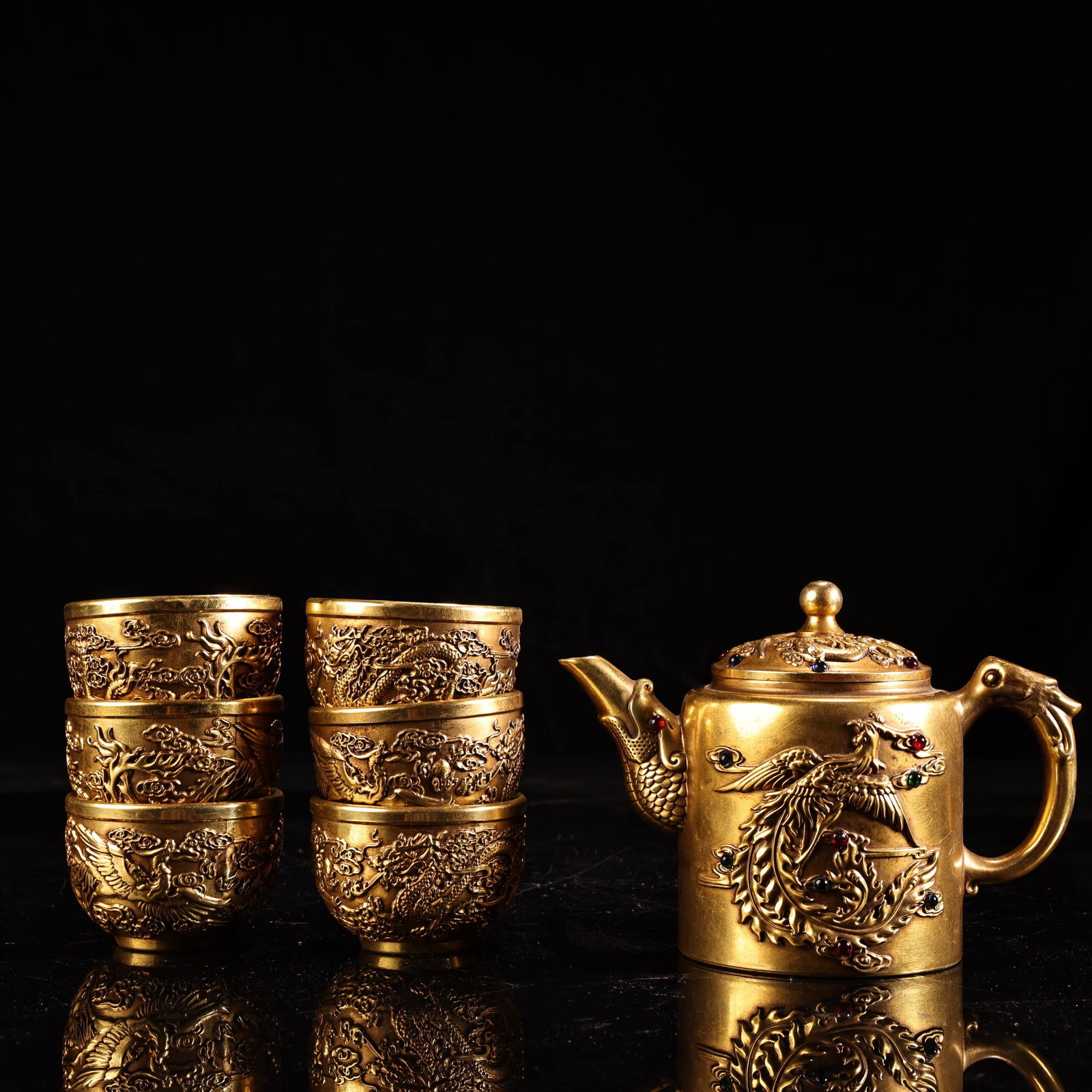A Set of Fine Gilt Bronze Dragon and Phoenix Pattern Wine Vessels,Inlaid Gems: A Set of Fine Gilt Bronze Dragon and Phoenix Pattern Wine Vessels,Inlaid Gems,Qing Dynasty,China,Qianlong Four-character Mark,Size:4.3inx5.9in,Weight:660g一套铜鎏金࿵