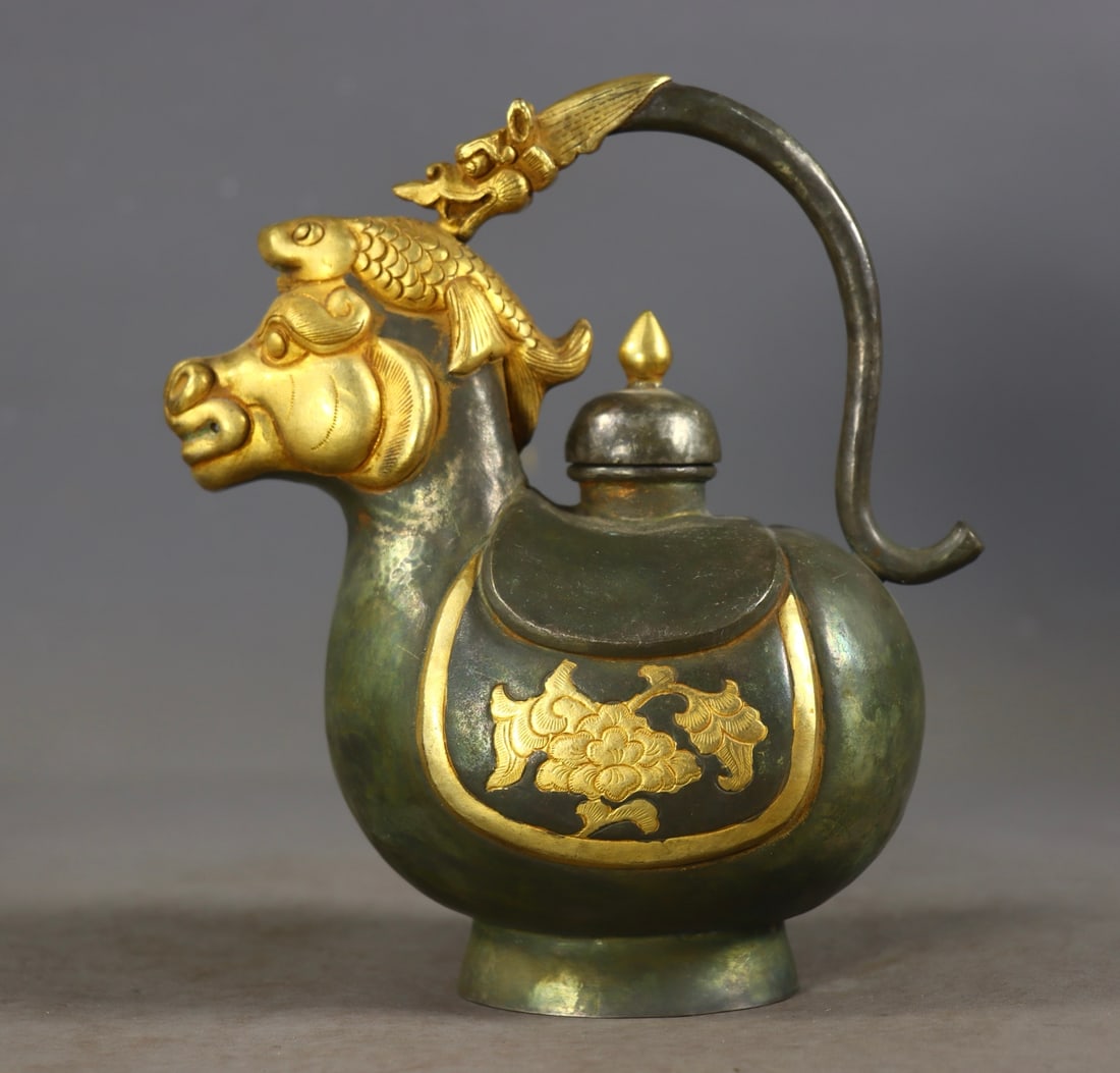 An Exquisite Gilt Bronze Flower and Fish Pattern Dragon Horse-head Pot: An Exquisite Gilt Bronze Flower and Fish Pattern Dragon Horse-head Pot,Tang Dynasty,China,Zhenguan Four-character Mark,Size:6.3inx5.3inx3.1in,Weight:411g铜鎏金花卉鱼