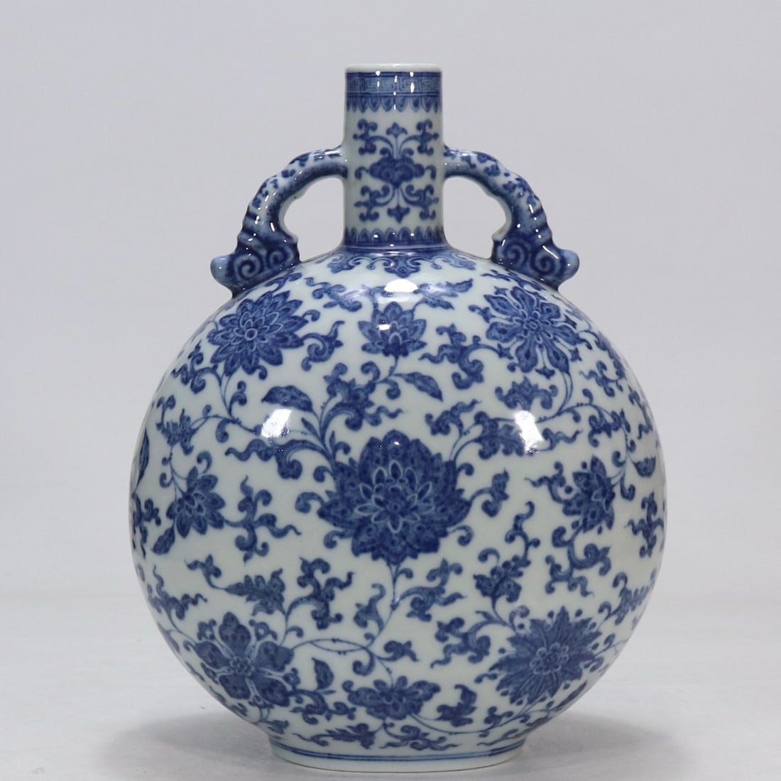 A Rare Blue and White Lotus Pattern Double-Ears Vase: A Rare Blue and White Lotus Pattern Double-Ears Vase,Qing Dynasty, China,Yongzheng Six-character Mark,Size:12.4in青花缠枝莲纹双耳瓶,中ࢲ