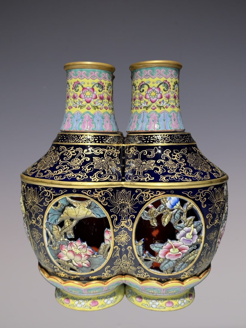 An Exquisite Enamel Yellow Ground Ji Blue Glazed Painted Gold Hollow Flower Pattern Conjoined: An Exquisite Enamel Yellow Ground Ji Blue Glazed Painted Gold Hollow Flower Pattern Conjoined bottles,Qing Dynasty, China,Qianlong Six-character Mark,Size:11inx9.8in珐琅彩黄