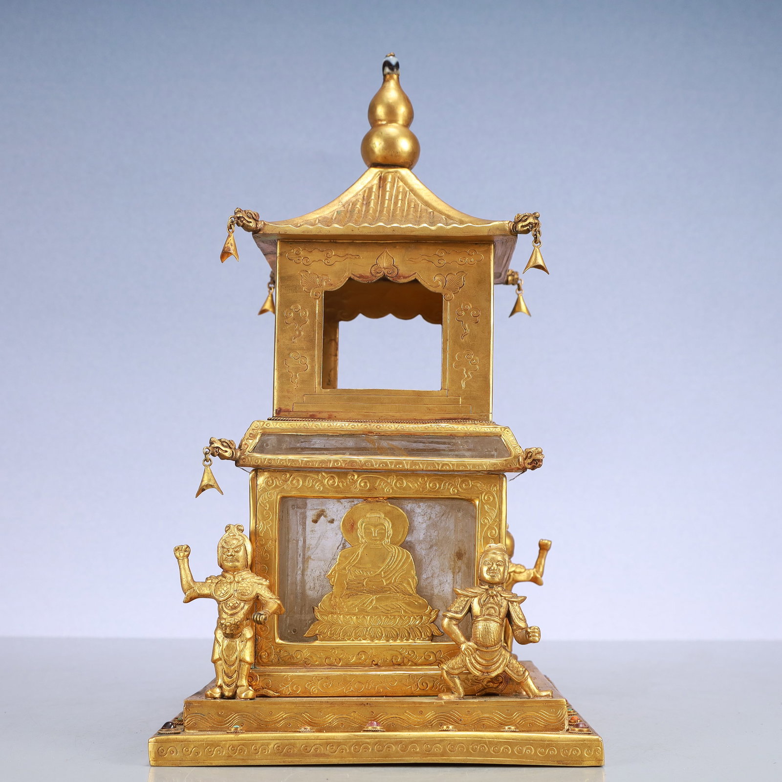 A Exquisite Gilt Bronze Inlaid Crystal with poem Pagoda: A Exquisite Gilt Bronze Inlaid Crystal with poem Pagoda Qing Dynasty, China Size:6.9inx12.6in Weight:3000g铜鎏金嵌水晶诗文佛塔