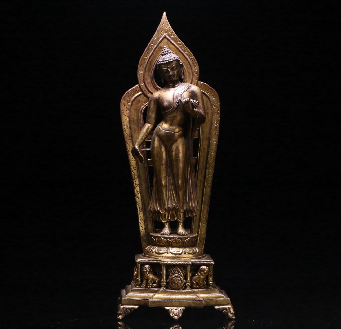 A Solemn Gilt Bronze Statue of Sakyamuni: A Solemn Gilt Bronze Statue of Sakyamuni,Qing Dynasty,China,Size:13.8inx5.1inx3.9in,Weight:2465g铜鎏金释迦摩尼像,中国清代,Size:3