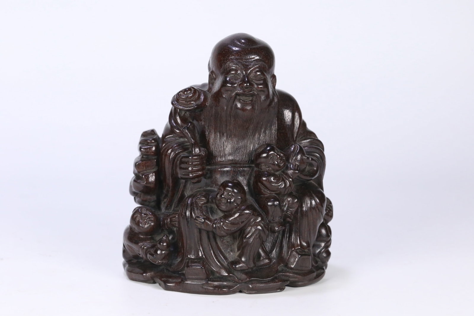 An Exquisite Zitanwood Figure Pattern Statue of Longevity: An Exquisite Zitanwood Figure Pattern Statue of Longevity,Qing Dynasty,China,Size:5.3inx4.6inx4.1in,Weight:657.3g紫檀木人物纹寿星像,中ࢲ