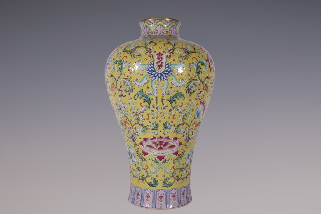 A Rare Famille-Rose Yellow Ground Painted Gold Lotus Pattern Vase: A Rare Famille-Rose Yellow Ground Painted Gold Lotus Pattern Vase,Qing Dynasty, China,Jiaqing Six-character Mark,Size:15inx3.5inx5.7in粉彩黄地描金缠枝&#
