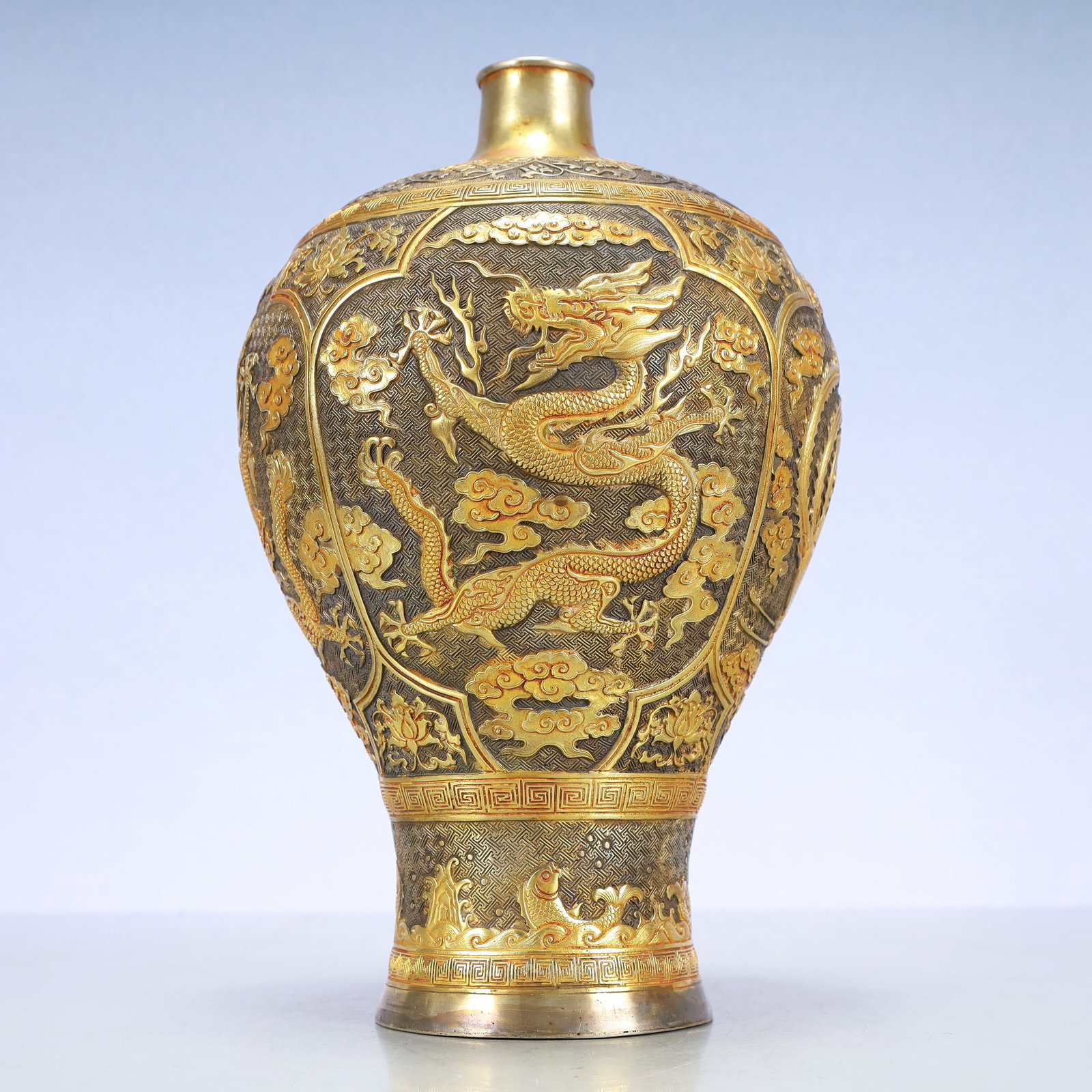 A Exquisite Gilt Silver Lotus Pattern Dragon and Phoenix Pattern Vase: A Exquisite Gilt Silver Lotus Pattern Dragon and Phoenix Pattern Vase Tang Dynasty, China Zhenguan Four-character Mark Size:7.9inx11.8in Weight:1950g铜鎏金银缠枝