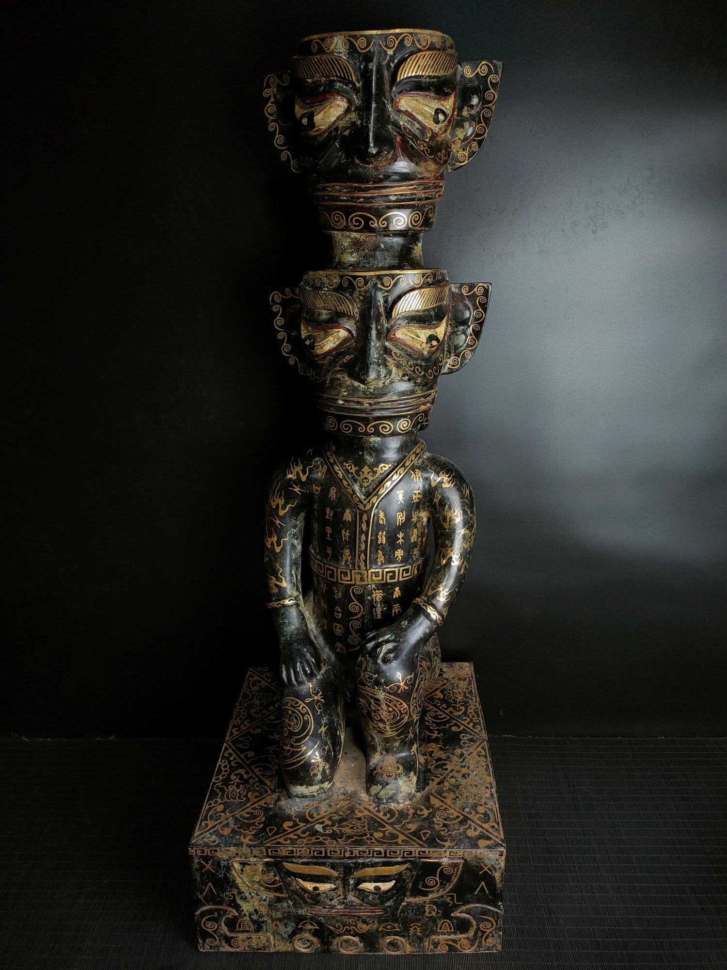 An Archaic Bronze Inscription Figure Ornament: An Archaic Bronze Inscription Figure Ornament,Qing Dynasty, China,Size:38.2inx13.4in,Weight:19200g青铜铭文人物摆件,中国清代,Size