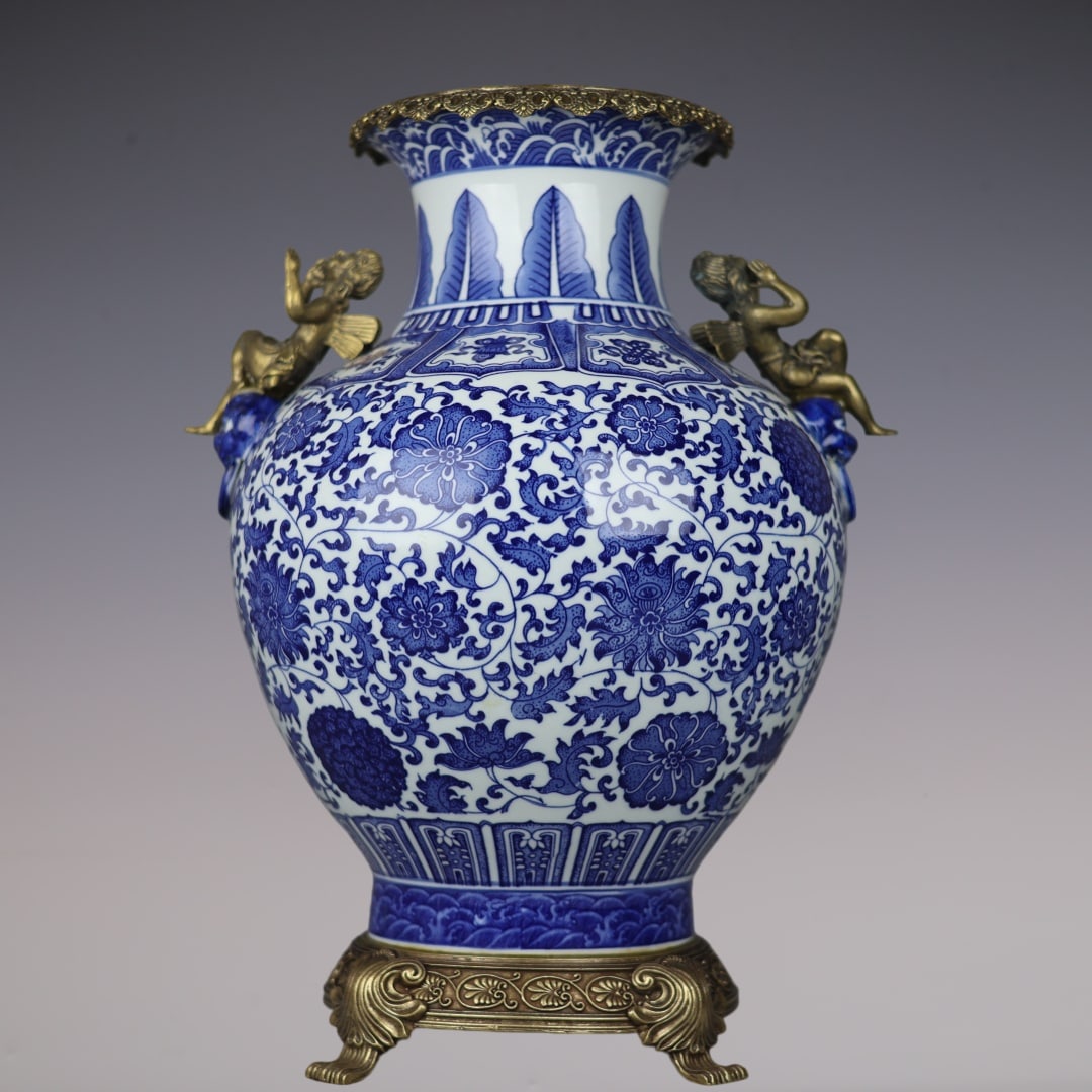 A Huge Blue and White Inlaid Bronze Lotus Pattern Figure-Ears Vase: A Huge Blue and White Inlaid Bronze Lotus Pattern Figure-Ears Vase,Qing Dynasty,China,Qianlong Six-character Mark,Size:18.9inx13.8inx7.9in青花镶铜缠枝莲ಬ