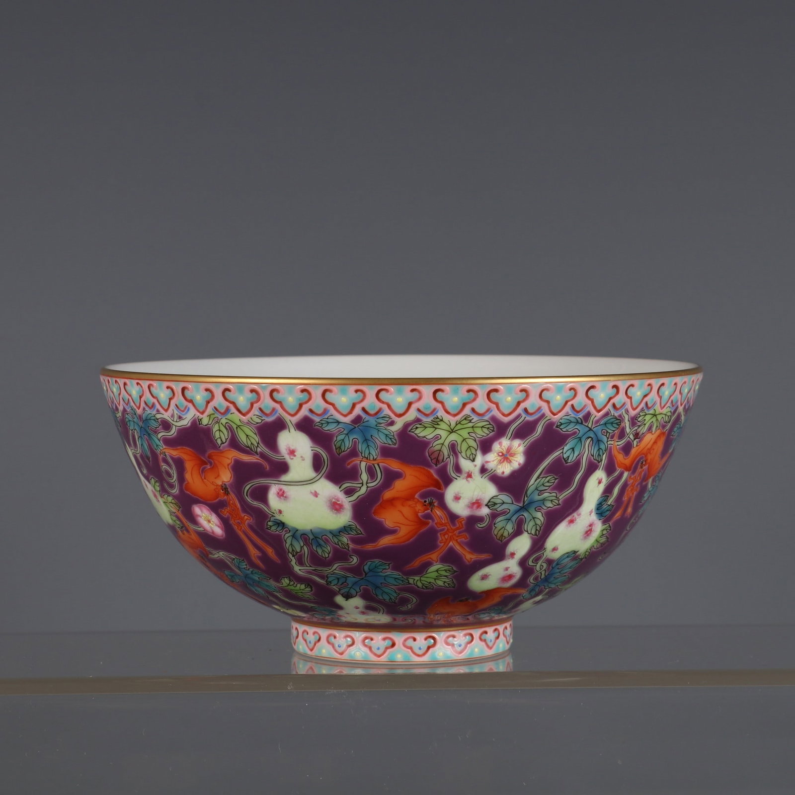 An Exquisite Purple Ground Famille-Rose Painted Gold Bats and Gourd Pattern Bowl: An Exquisite Purple Ground Famille-Rose Painted Gold Bats and Gourd Pattern Bowl,Qing Dynasty, China,Yongzheng Six-character Mark,Size:2.8inx5.7in紫地粉彩描金ඈ