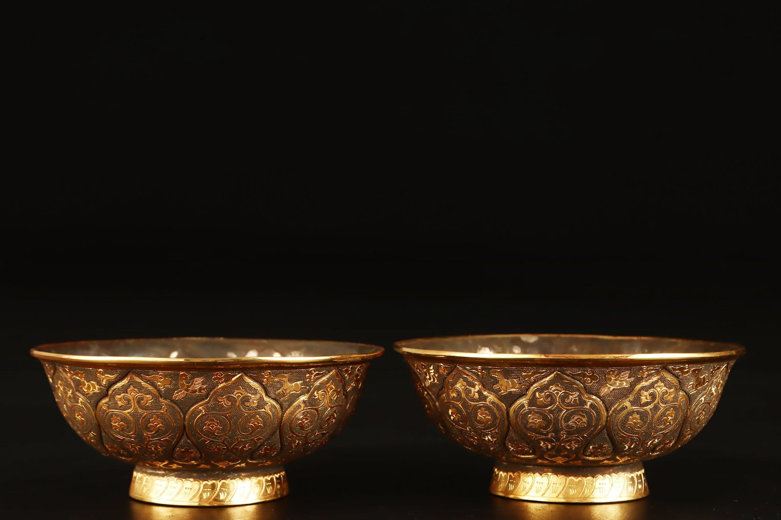 A Pair of Exquisite Gilt Bronze Flower and Bird Pattern Bowls: A Pair of Exquisite Gilt Bronze Flower and Bird Pattern Bowls,Qing Dynasty,China,Qianlong Four-character Mark,Size:2.4inx5.3in,Total Weight:924g一对铜鎏金花鸟