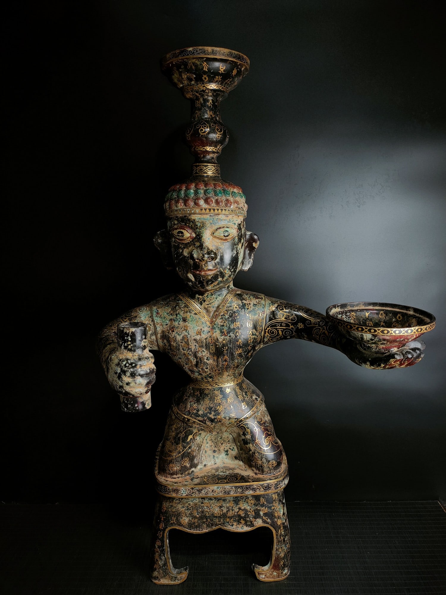An Archaic Bronze Inlaid Gold Painted Color Figure-Shaped Candlestick,With Inscription (1 of 8)