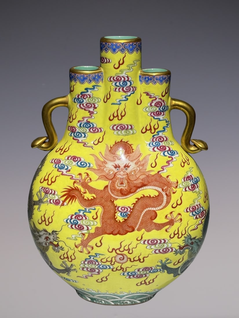 An Exquisite Famille-Rose Yellow Ground Seawater,Auspicious Cloud and Dragon Pattern Ruyi-Ears Vase: An Exquisite Famille-Rose Yellow Ground Seawater,Auspicious Cloud and Dragon Pattern Ruyi-Ears Vase,Qing Dynasty, China,Yongzheng Four-character Mark,Size:11.2inx7.5in粉彩黄地&