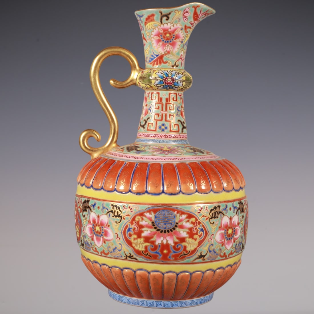 An Exquisite Enamel Painted Gold Lotus Pattern Ewer: An Exquisite Enamel Painted Gold Lotus Pattern Ewer,Qing Dynasty, China,Qianlong Six-character Mark,Size:7.5inx4.7in珐琅彩描金缠枝莲纹执