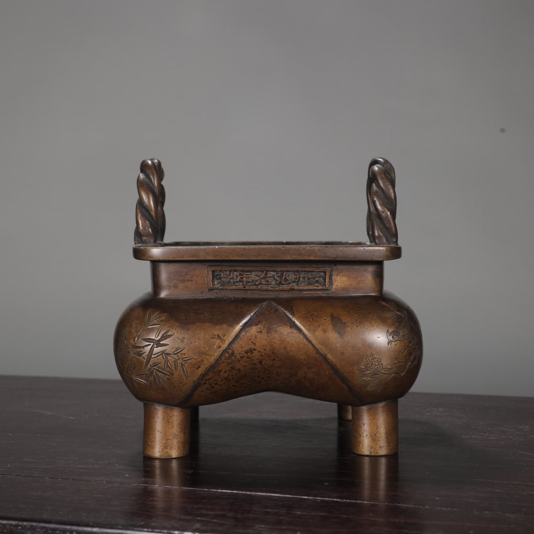 An Exquisite Bronze Flower and Bird Pattern Double-Ears Four Legs Censer: An Exquisite Bronze Flower and Bird Pattern Double-Ears Four Legs Censer,Ming Dynasty,China,Hongzhi Six-character Mark,Size:5inx4.7inx5.5in,Weight:1950g铜花鸟纹双耳
