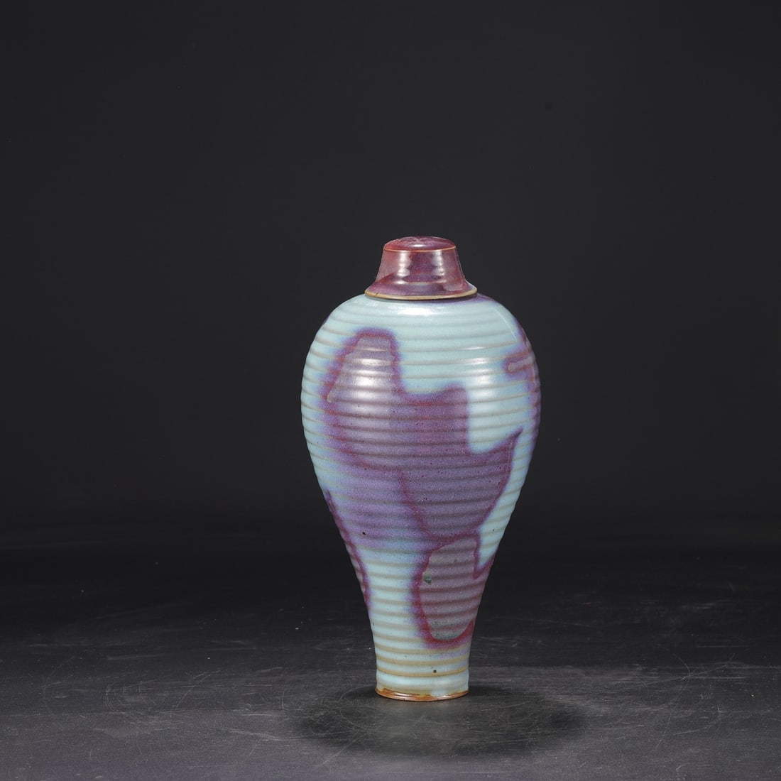 A Rare Jun yao Bottle: A Rare Jun yao Bottle,Song Dynasty, China,Royal Court Mark,Size:12.8inx1.2inx5.9in钧窑盖瓶,中国宋代,宫廷款,Size:32.5cmx3cmx15cm