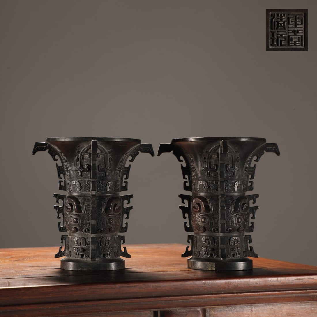 A Pair of Exquisite Bronze Beast-Face Pattern Vases: A Pair of Exquisite Bronze Beast-Face Pattern Vases,Ming Dynasty,China,With Mark,Size:4.3inx4.3in,Total Weight:1000g一对铜兽面纹瓶，中国
