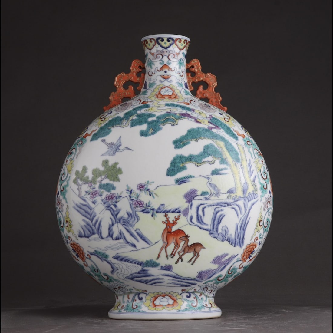 An Exquisite Blue and White Doucai Deer and Crane Pattern Double-Ears Vase: An Exquisite Blue and White Doucai Deer and Crane Pattern Double-Ears Vase,Qing Dynasty, China,Qianlong Six‑character Mark,Size:13.6inx10.2in 青花斗彩鹿鹤 