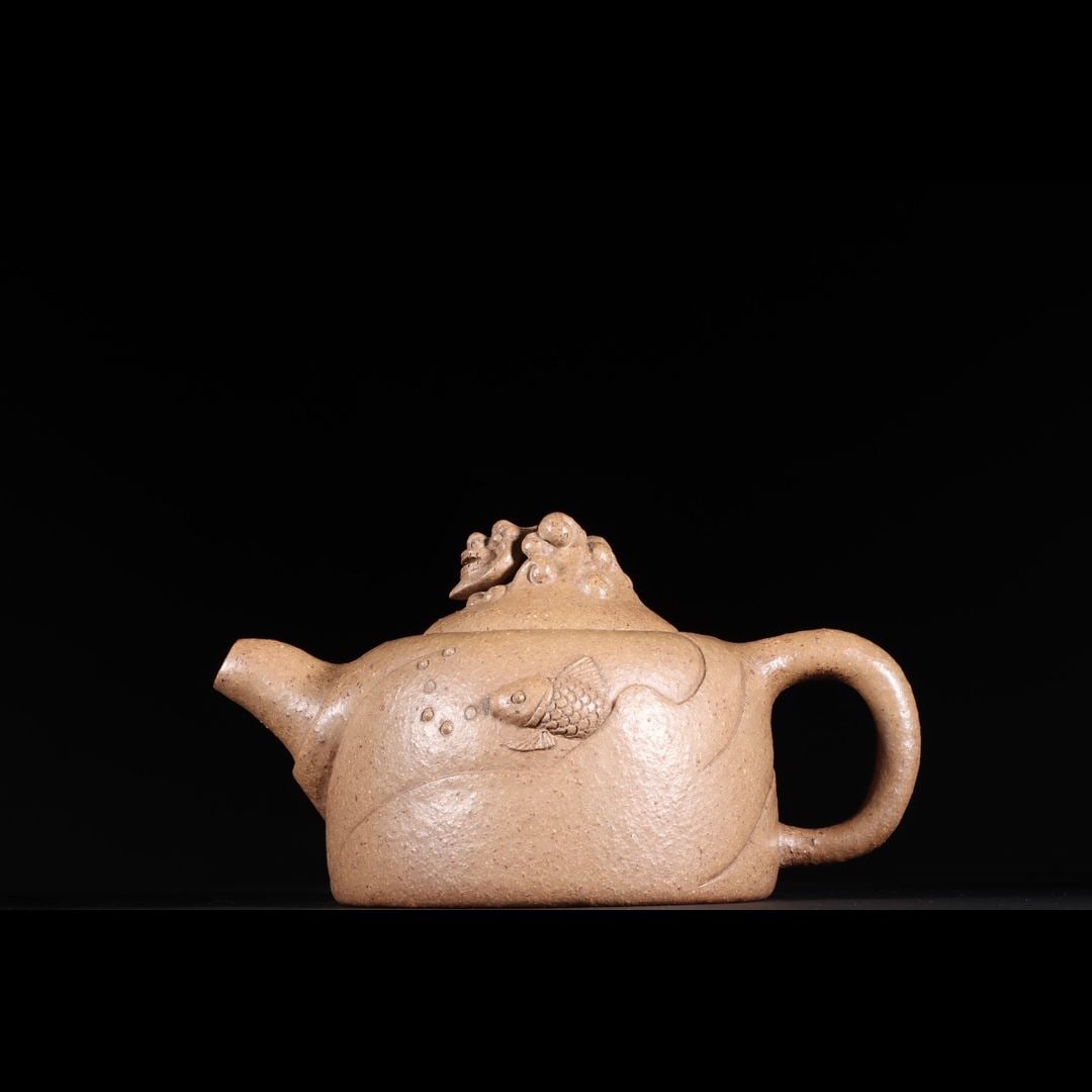An Exquisite Zisha Fish Pattern Teapot: An Exquisite Zisha Fish Pattern Teapot,Qing Dynasty, China,With Mark,Size:4.7inx8.3in 紫砂鱼纹壶,中国清代,带款