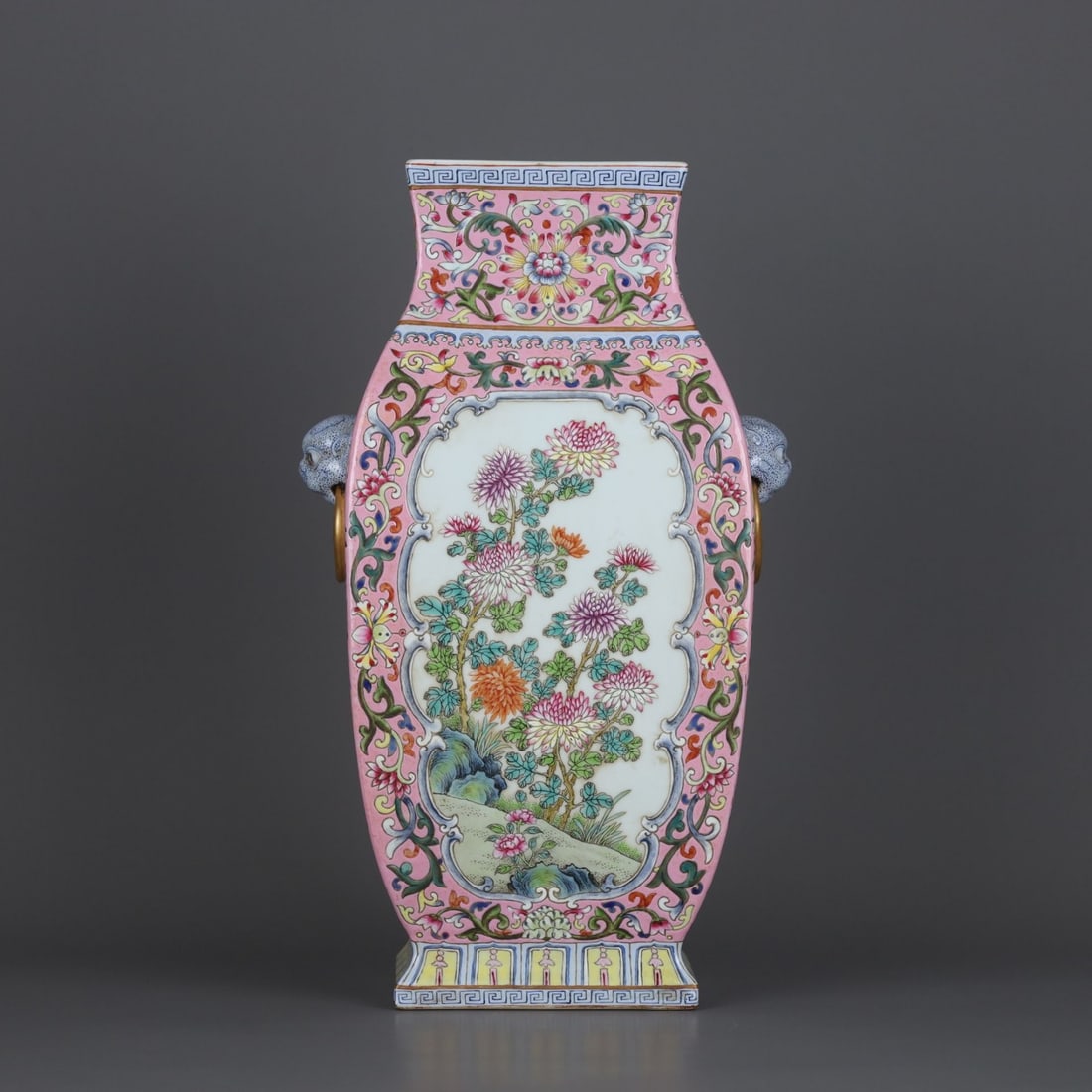 An Exquisite Ruby Red-Glazed Ground Famille-Rose Flower Pattern Beast-Ears Vase: An Exquisite Ruby Red-Glazed Ground Famille-Rose Flower Pattern Beast-Ears Vase,Qing Dynasty, China,Qianlong Six-character Mark,Size:11.7inx7.2in 胭脂红地粉彩഑