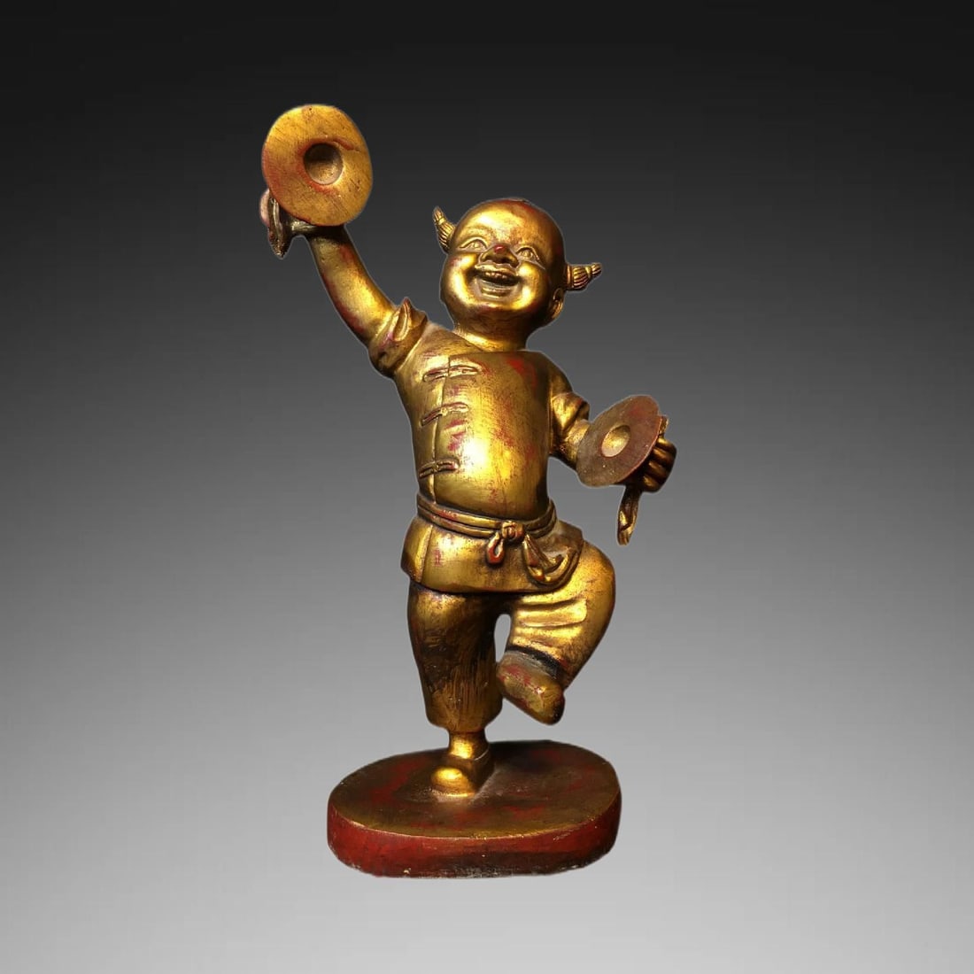 An Exquisite Bronze Lacquered-Gilt Figure Ornament: An Exquisite Bronze Lacquered-Gilt Figure Ornament,Qing Dynasty, China,Size:6.3inx3.5inx11.4in,Weight:1675g 铜漆金人物摆件,中国清代