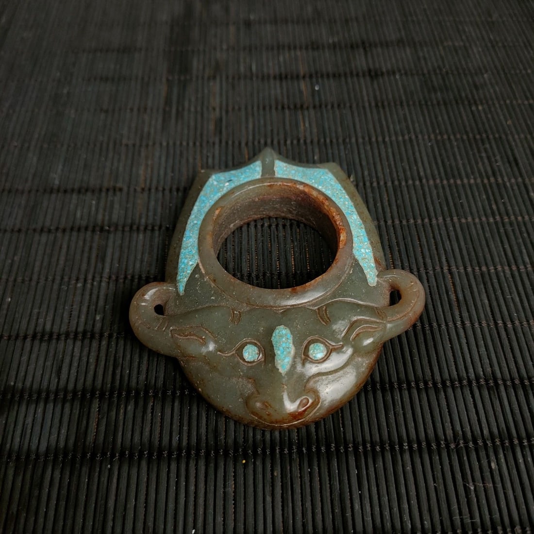 An Exquisite Hotan Jade Inlaid Turquoise Buffalo Hook: An Exquisite Hotan Jade Inlaid Turquoise Buffalo Hook,Han Dynasty,China,Size:3.1inx2.6in,Weight:71g 和田玉镶松石牛扣,中国汉代
