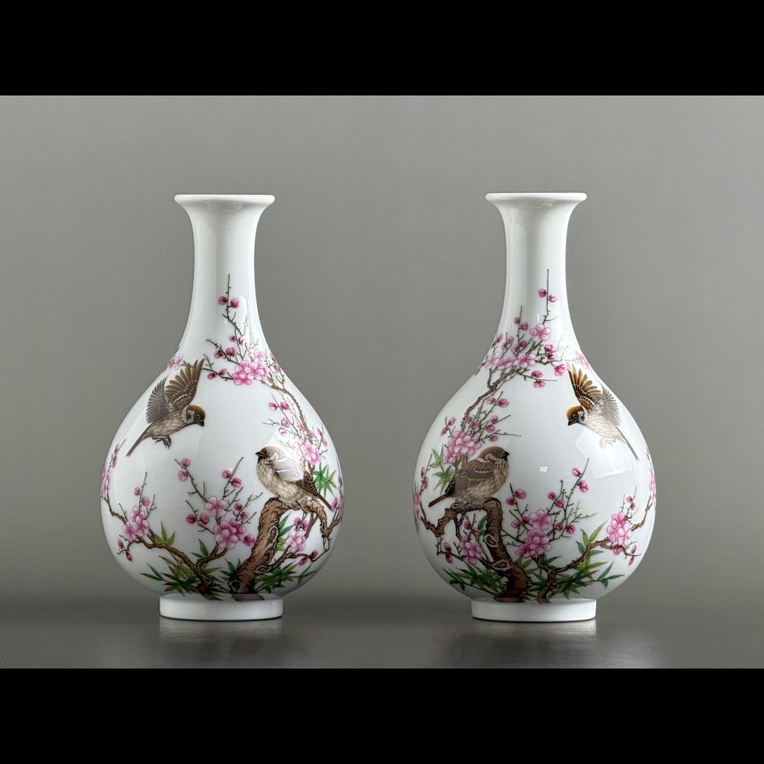 A pair of Exquisite Enamel Flower and Bird Pattern Vase: A pair of Exquisite Enamel Flower and Bird Pattern Vase,Qing Dynasty, China,Qianlong Four‑character Mark,Size:1.3inx5.6inx3.3inx1.6in 一对珐琅彩花鸟 