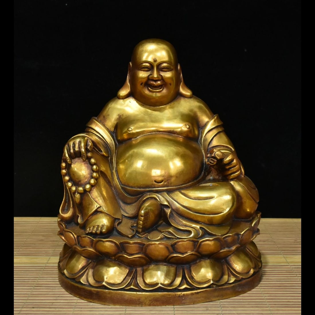 An Exquisite Gilt Bronze Maitreya Buddha Ornament: An Exquisite Gilt Bronze Maitreya Buddha Ornament,Ming Dynasty, China,Xuande Four‑Character Mark,Size:11inx9.1inx7.9in,Weight:6900g