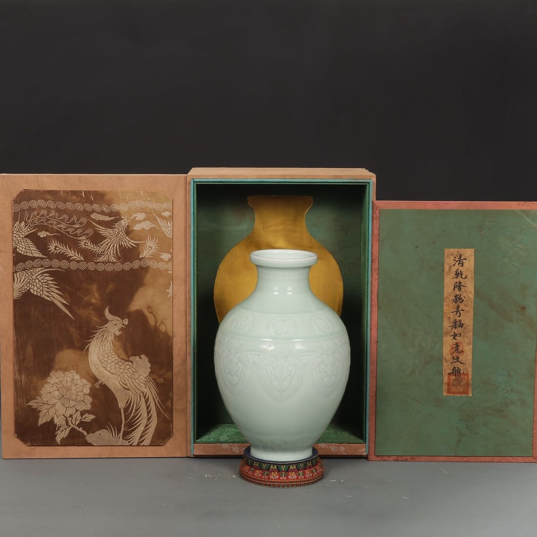 An Exquisite Celadon Glazed Ruyi Pattern Vase: An Exquisite Celadon Glazed Ruyi Pattern Vase,Qing Dynasty, China,Qianlong Six-character Mark,Size:11inx3.5inx7.1in